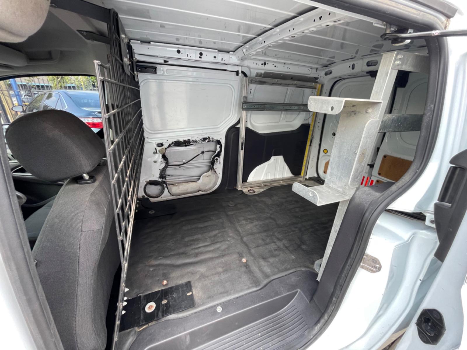 2014 White /Black Ford Transit Connect XLT LWB (NM0LS7F75E1) with an 2.5L L4 DOHC 16V engine, 6-Speed Automatic transmission, located at 1501 West 15th St., Houston, 77008, (713) 869-2925, 29.797941, -95.411789 - Photo #5