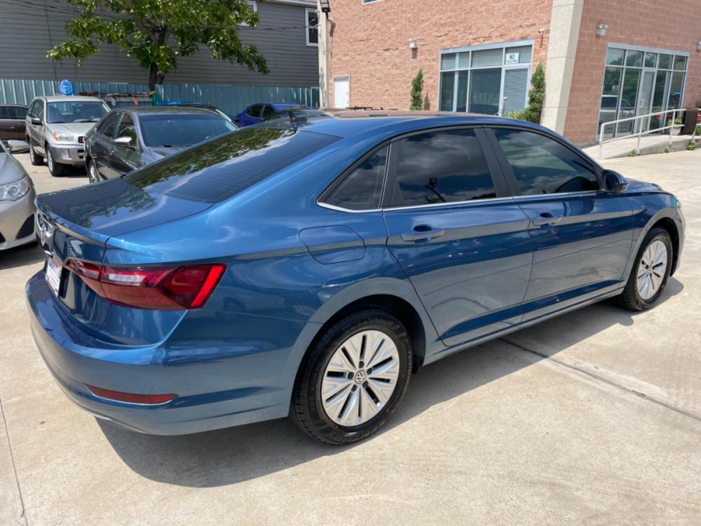 2020 Blue /Silver Volkswagen Jetta 1.4T S 6M (3VWN57BU5LM) with an 1.4L L4 DOHC 20V engine, 6M transmission, located at 1501 West 15th St., Houston, 77008, (713) 869-2925, 29.797941, -95.411789 - Photo #2