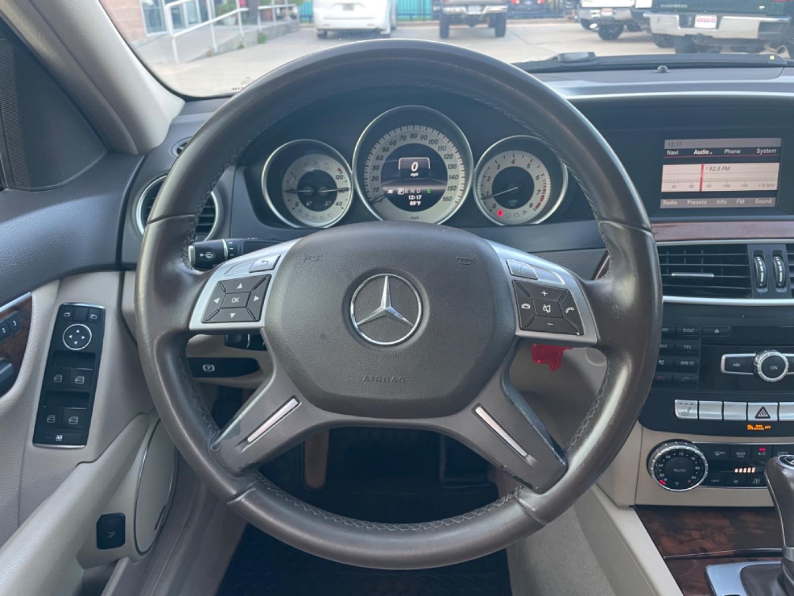 2013 Brown /Beige Mercedes-Benz C-Class C250 Sport Sedan (WDDGF4HBXDR) with an 3.0L V6 DOHC 16V engine, 7-Speed Automatic transmission, located at 1501 West 15th St., Houston, 77008, (713) 869-2925, 29.797941, -95.411789 - Photo #9