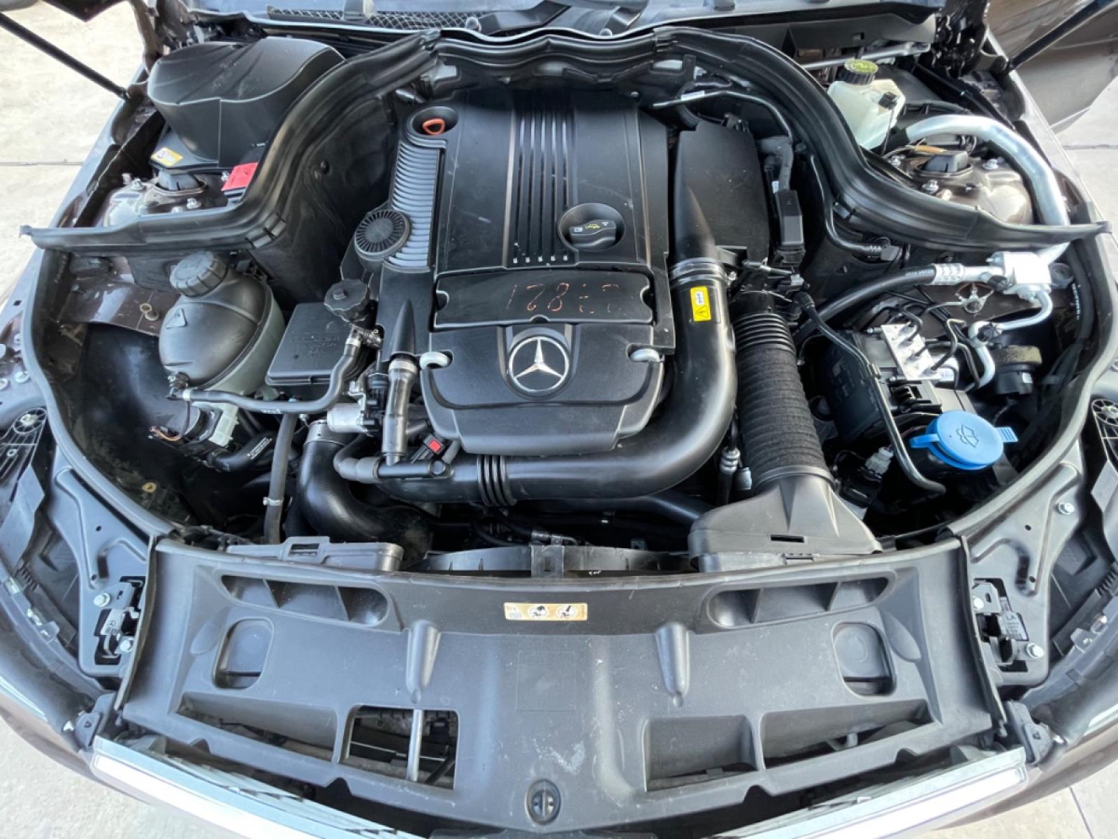 2013 Brown /Beige Mercedes-Benz C-Class C250 Sport Sedan (WDDGF4HBXDR) with an 3.0L V6 DOHC 16V engine, 7-Speed Automatic transmission, located at 1501 West 15th St., Houston, 77008, (713) 869-2925, 29.797941, -95.411789 - Photo #13
