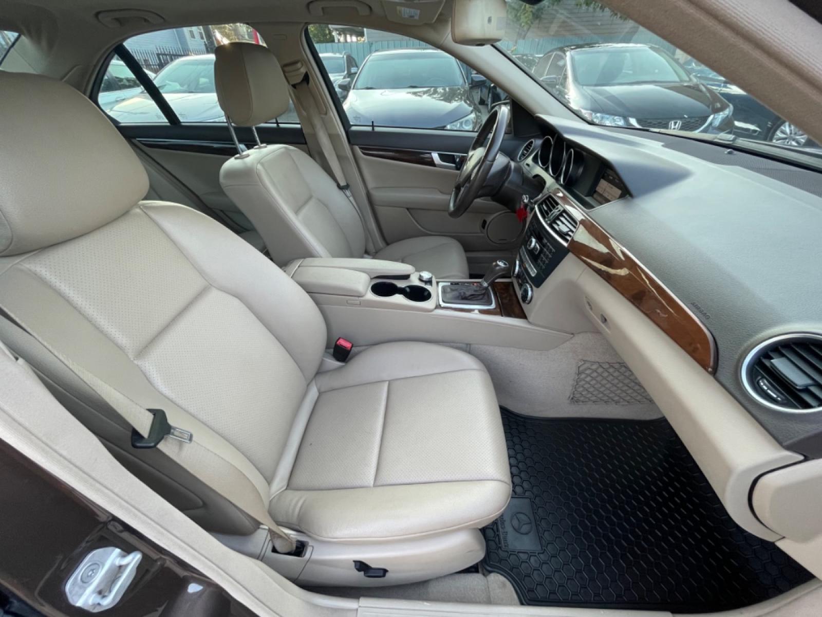 2013 Brown /Beige Mercedes-Benz C-Class C250 Sport Sedan (WDDGF4HBXDR) with an 3.0L V6 DOHC 16V engine, 7-Speed Automatic transmission, located at 1501 West 15th St., Houston, 77008, (713) 869-2925, 29.797941, -95.411789 - Photo #7