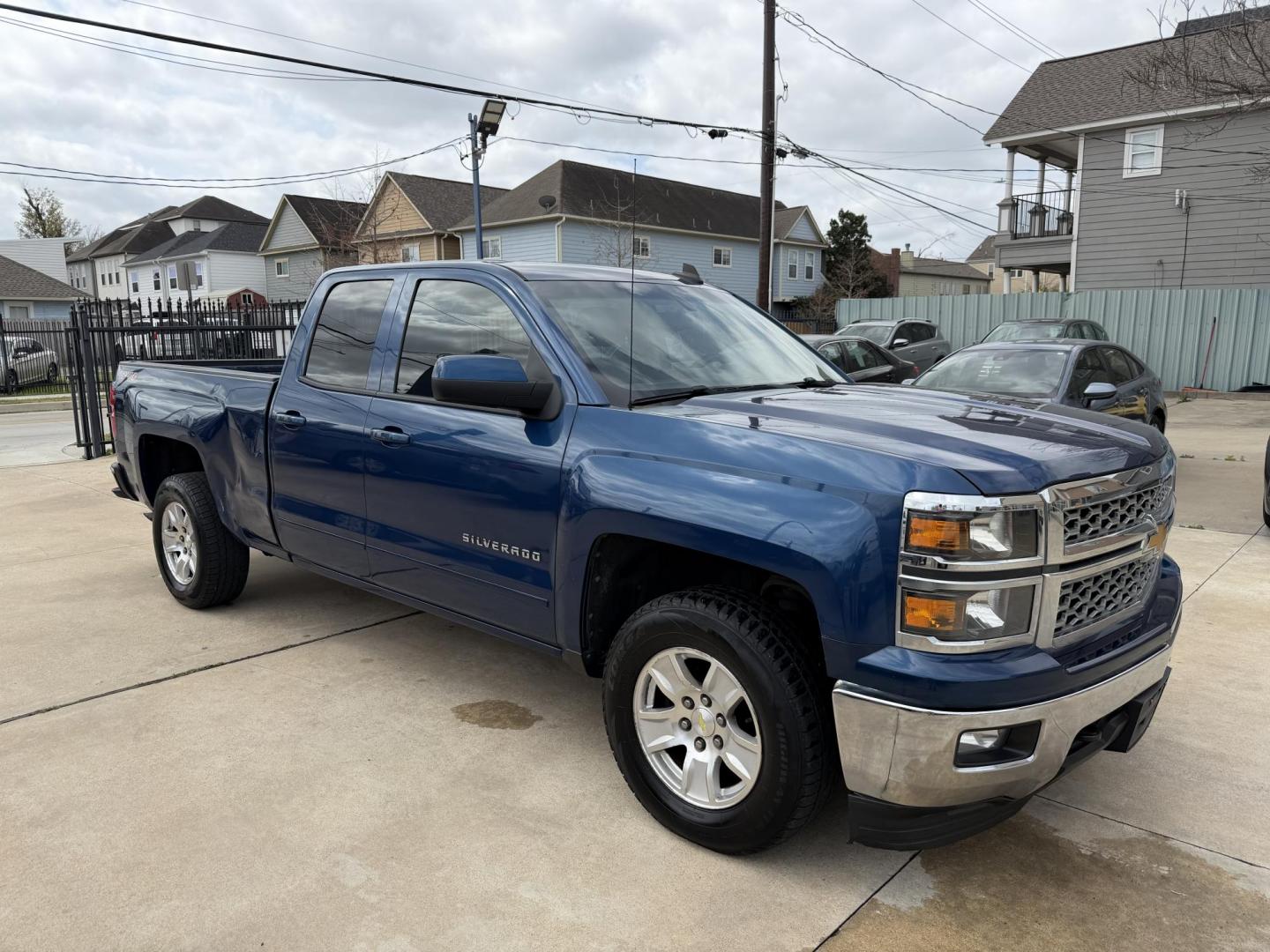 2015 Blue /Beige Chevrolet Silverado 1500 LT (1GCVKREC5FZ) with an 5.3L V8 OHV 16V engine, 6-Speed Automatic transmission, located at 1501 West 15th St., Houston, 77008, (713) 869-2925, 29.797941, -95.411789 - Photo#1