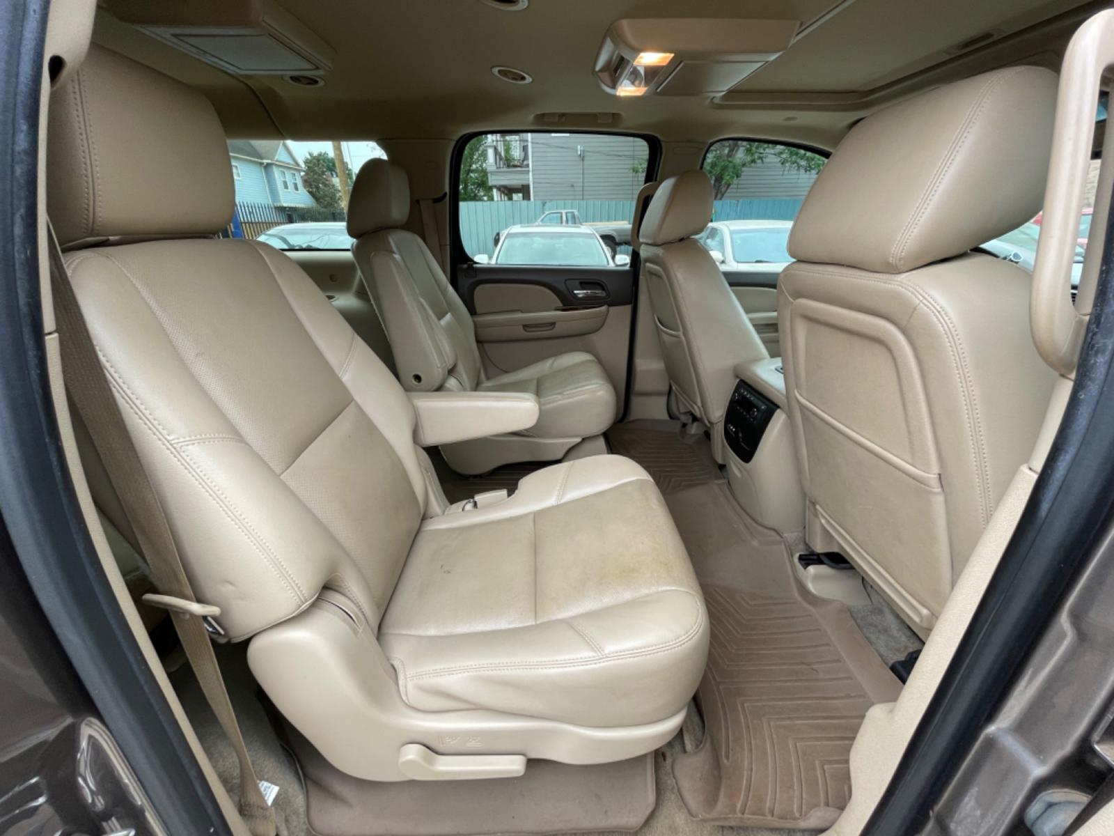2014 Brown /Beige Chevrolet Suburban LTZ (1GNSCKE04ER) with an 5.3L V8 OHV 16V FFV engine, 6-Speed Automatic transmission, located at 1501 West 15th St., Houston, 77008, (713) 869-2925, 29.797941, -95.411789 - Photo #11
