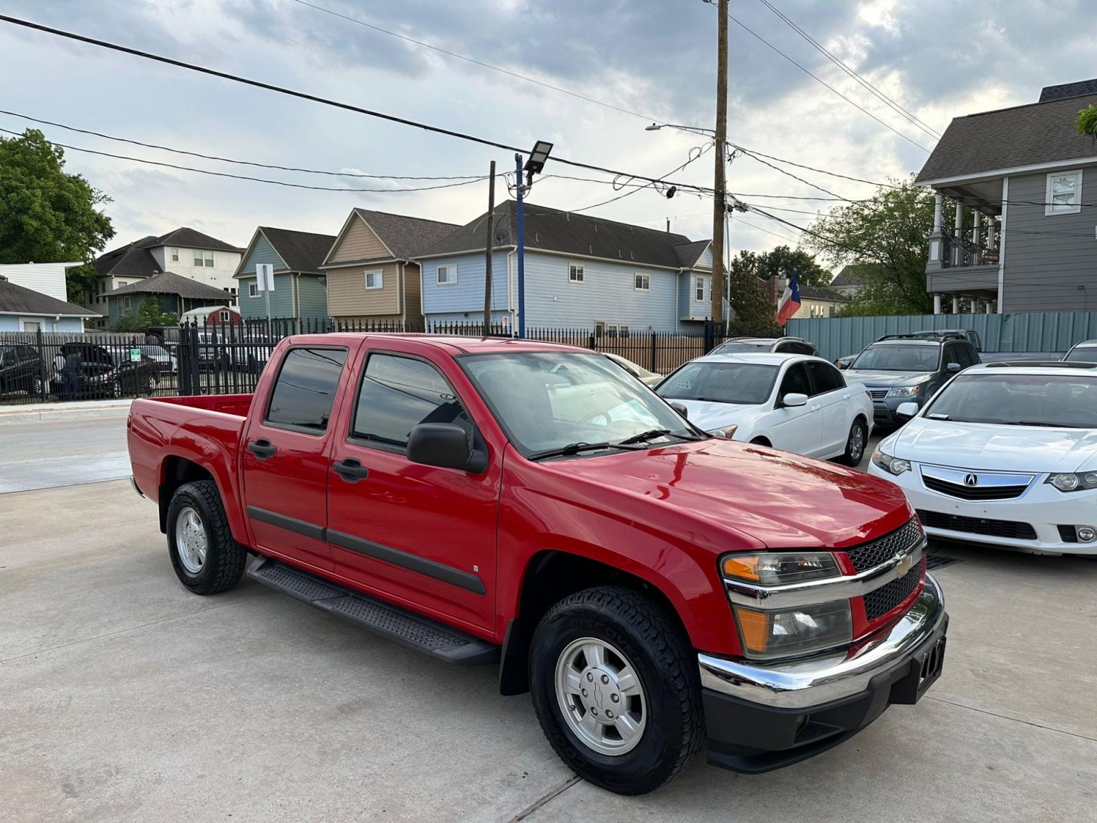 2007 Red /Black Chevrolet Colorado LT1 Crew Cab 2WD (1GCCS13E078) with an 3.7L L5 DOHC 20V engine, 4-Speed Automatic Overdrive transmission, located at 1501 West 15th St., Houston, 77008, (713) 869-2925, 29.797941, -95.411789 - Photo #1