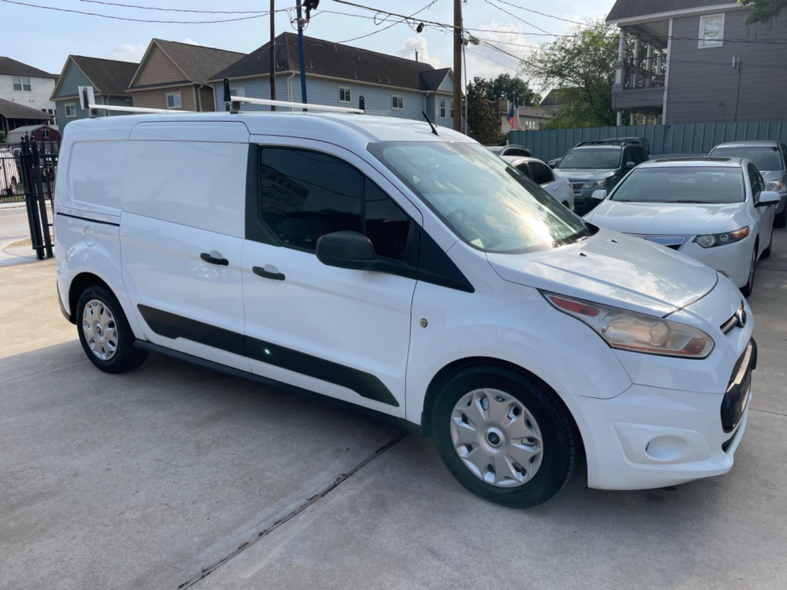 2014 White /Black Ford Transit Connect XLT LWB (NM0LS7F75E1) with an 2.5L L4 DOHC 16V engine, 6-Speed Automatic transmission, located at 1501 West 15th St., Houston, 77008, (713) 869-2925, 29.797941, -95.411789 - Photo #1