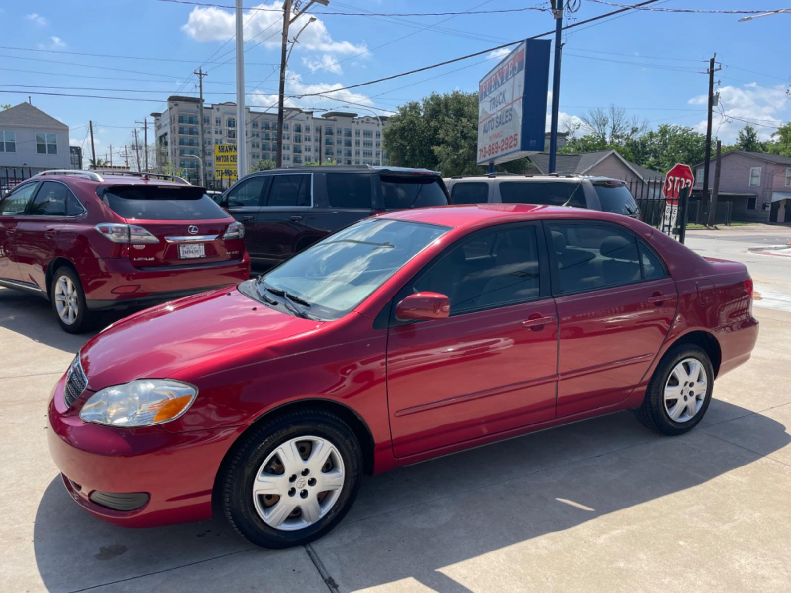2006 Red /Beige Toyota Corolla LE (1NXBR32E86Z) with an 1.8L L4 DOHC 16V engine, Automatic transmission, located at 1501 West 15th St., Houston, 77008, (713) 869-2925, 29.797941, -95.411789 - Photo #0