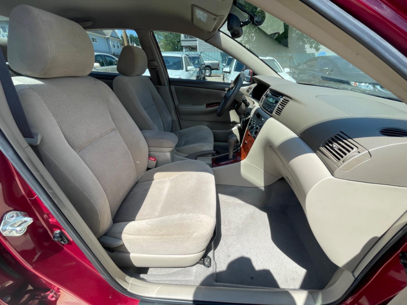2006 Red /Beige Toyota Corolla LE (1NXBR32E86Z) with an 1.8L L4 DOHC 16V engine, Automatic transmission, located at 1501 West 15th St., Houston, 77008, (713) 869-2925, 29.797941, -95.411789 - Photo #7