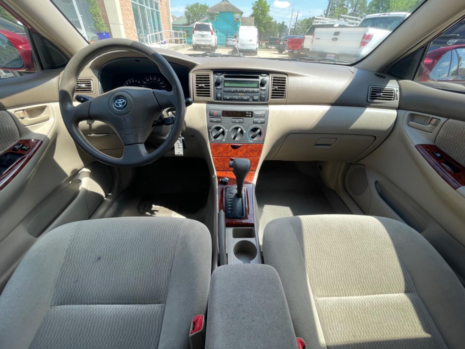2006 Red /Beige Toyota Corolla LE (1NXBR32E86Z) with an 1.8L L4 DOHC 16V engine, Automatic transmission, located at 1501 West 15th St., Houston, 77008, (713) 869-2925, 29.797941, -95.411789 - Photo #8