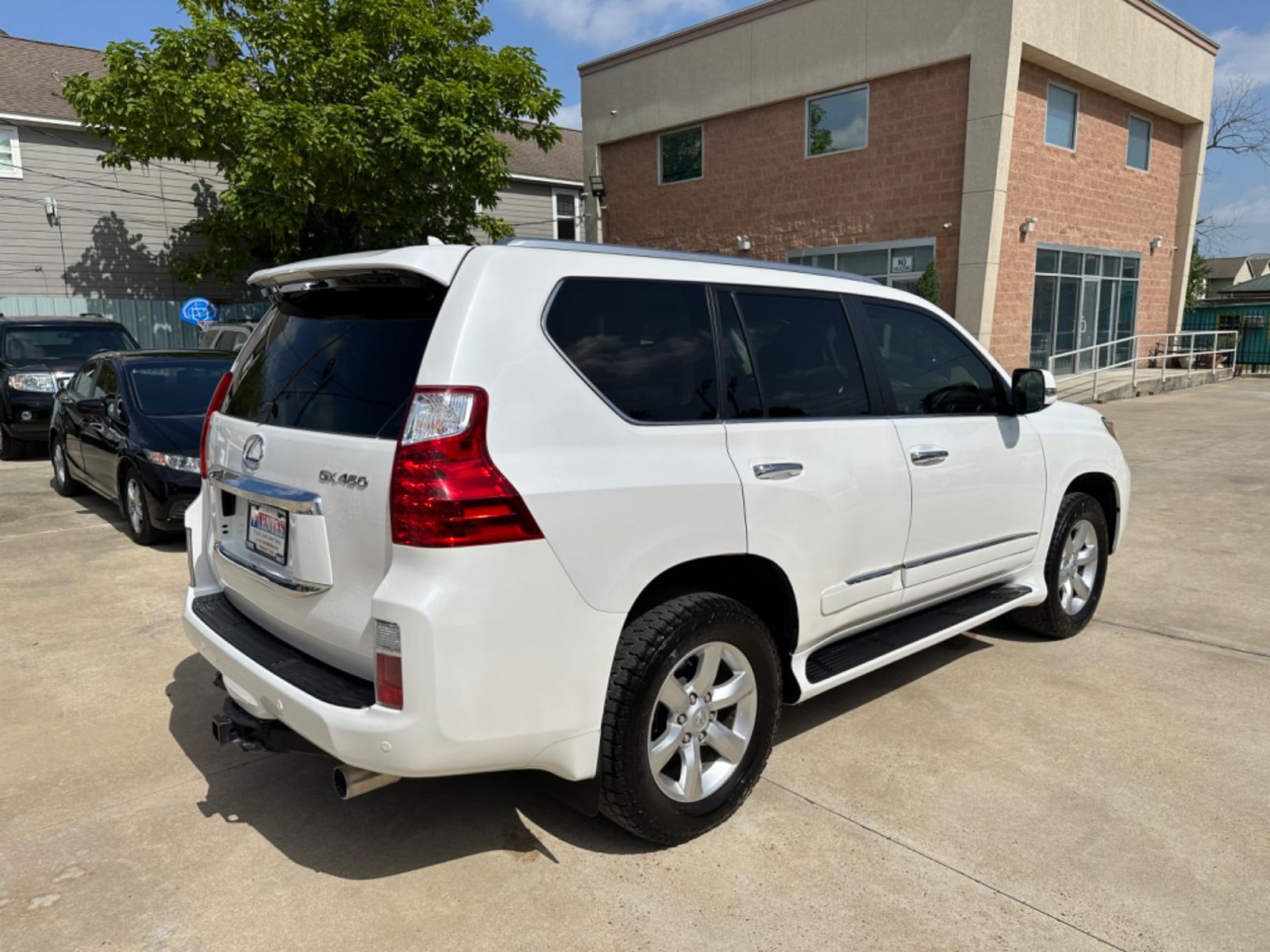 2011 White /Brown Lexus GX 460 Premium (JTJJM7FX3B5) with an 4.6L V8 DOHC 32V engine, 6-Speed Automatic transmission, located at 1501 West 15th St., Houston, 77008, (713) 869-2925, 29.797941, -95.411789 - Photo #2