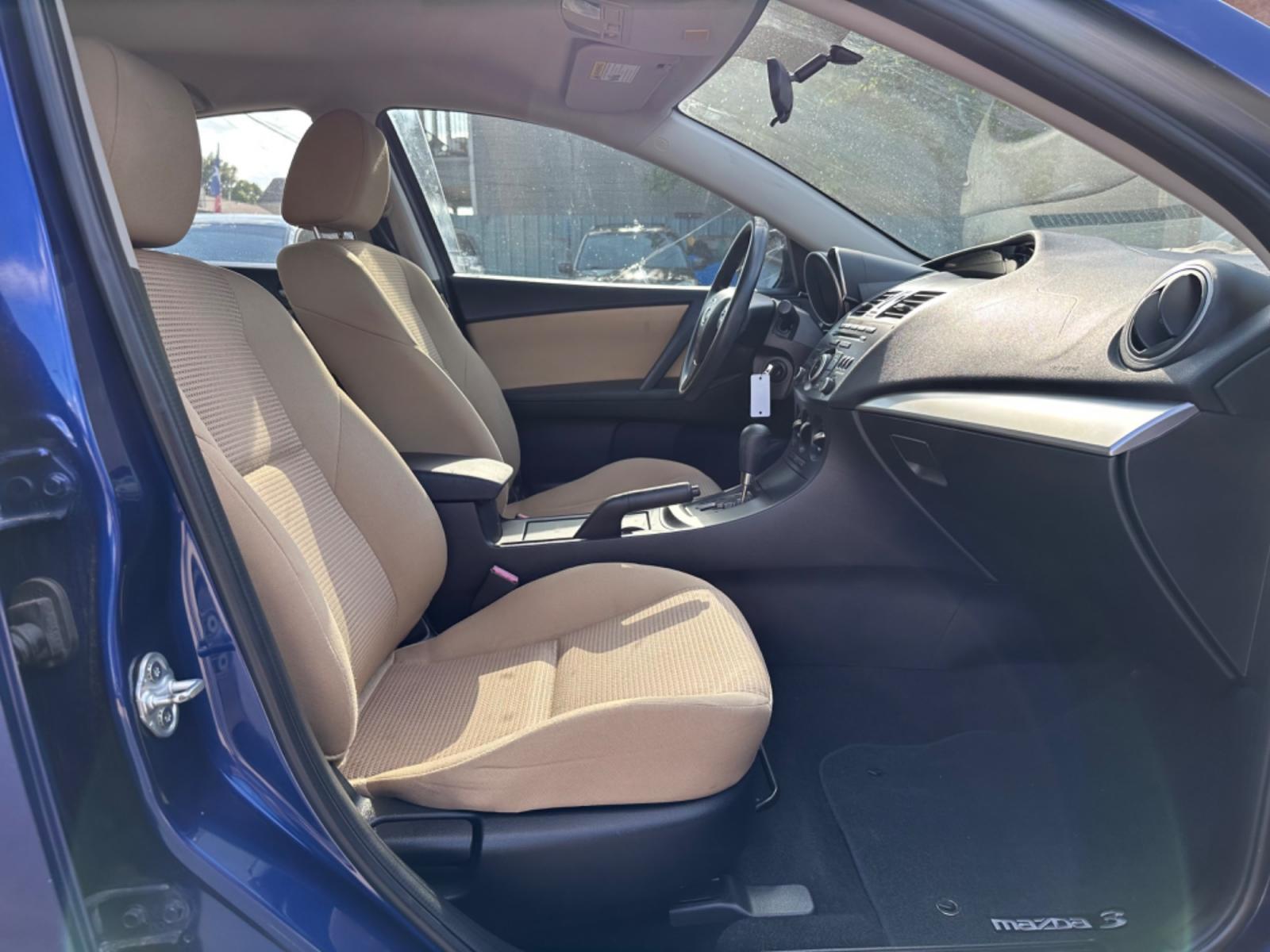 2012 Blue /Beige Mazda MAZDA3 i Touring 4-Door (JM1BL1VF1C1) with an 2.0L L4 DOHC 16V engine, Auto transmission, located at 1501 West 15th St., Houston, 77008, (713) 869-2925, 29.797941, -95.411789 - Photo #4