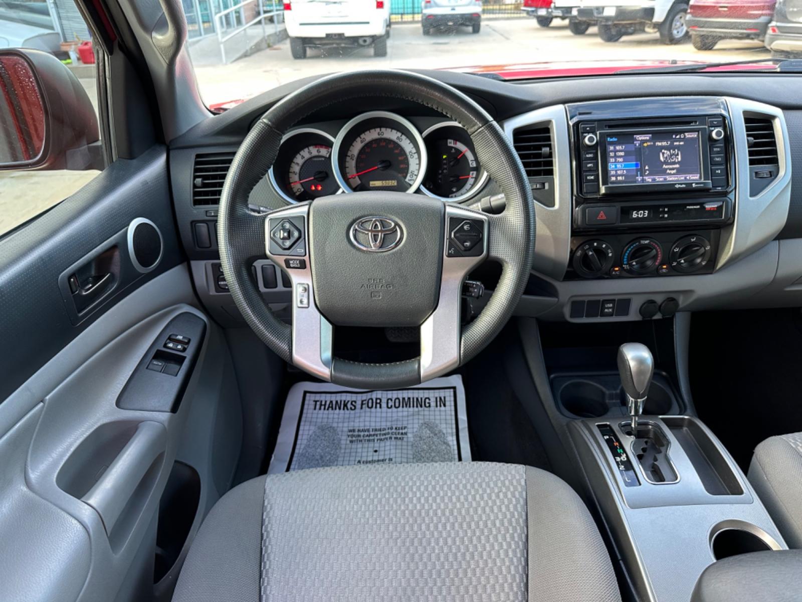 2014 Red /Silver Toyota Tacoma Access Cab I4 4AT 2WD (5TFTX4CN8EX) with an 2.7L L4 DOHC 16V engine, 4-Speed Automatic transmission, located at 1501 West 15th St., Houston, 77008, (713) 869-2925, 29.797941, -95.411789 - Photo #8