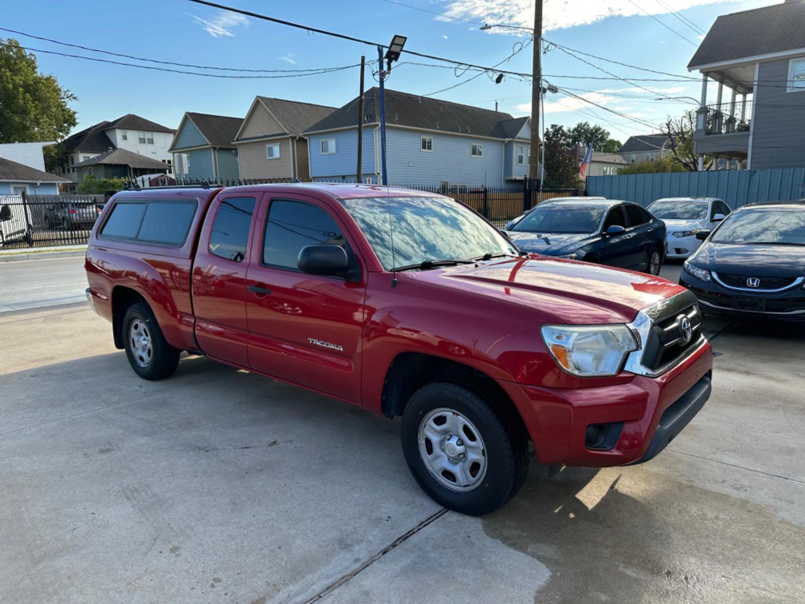 2014 Red /Silver Toyota Tacoma Access Cab I4 4AT 2WD (5TFTX4CN8EX) with an 2.7L L4 DOHC 16V engine, 4-Speed Automatic transmission, located at 1501 West 15th St., Houston, 77008, (713) 869-2925, 29.797941, -95.411789 - Photo #1