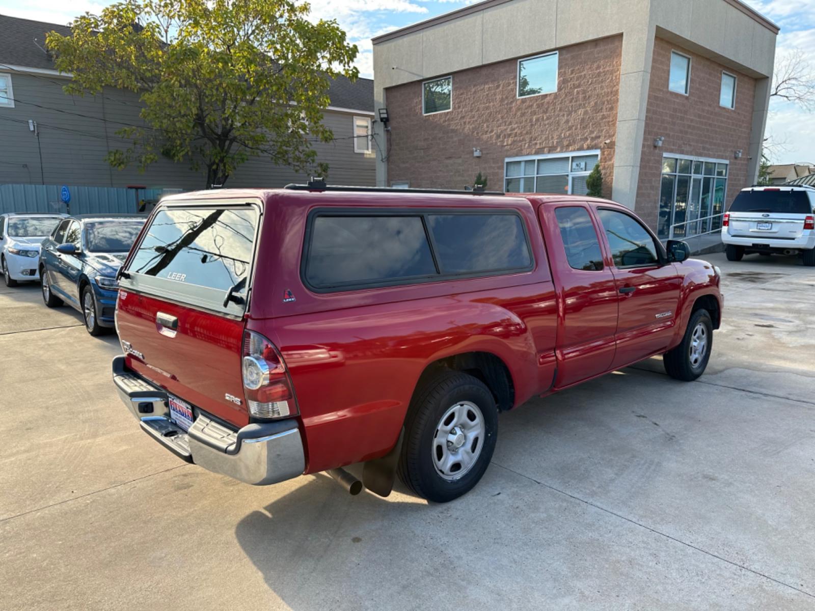 2014 Red /Silver Toyota Tacoma Access Cab I4 4AT 2WD (5TFTX4CN8EX) with an 2.7L L4 DOHC 16V engine, 4-Speed Automatic transmission, located at 1501 West 15th St., Houston, 77008, (713) 869-2925, 29.797941, -95.411789 - Photo #2