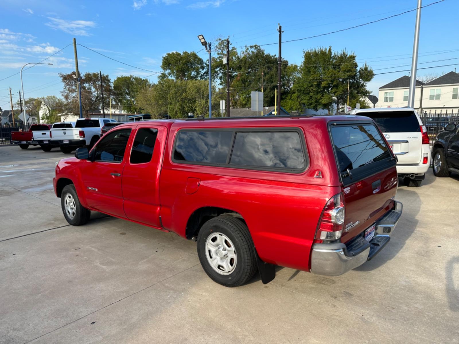 2014 Red /Silver Toyota Tacoma Access Cab I4 4AT 2WD (5TFTX4CN8EX) with an 2.7L L4 DOHC 16V engine, 4-Speed Automatic transmission, located at 1501 West 15th St., Houston, 77008, (713) 869-2925, 29.797941, -95.411789 - Photo #3