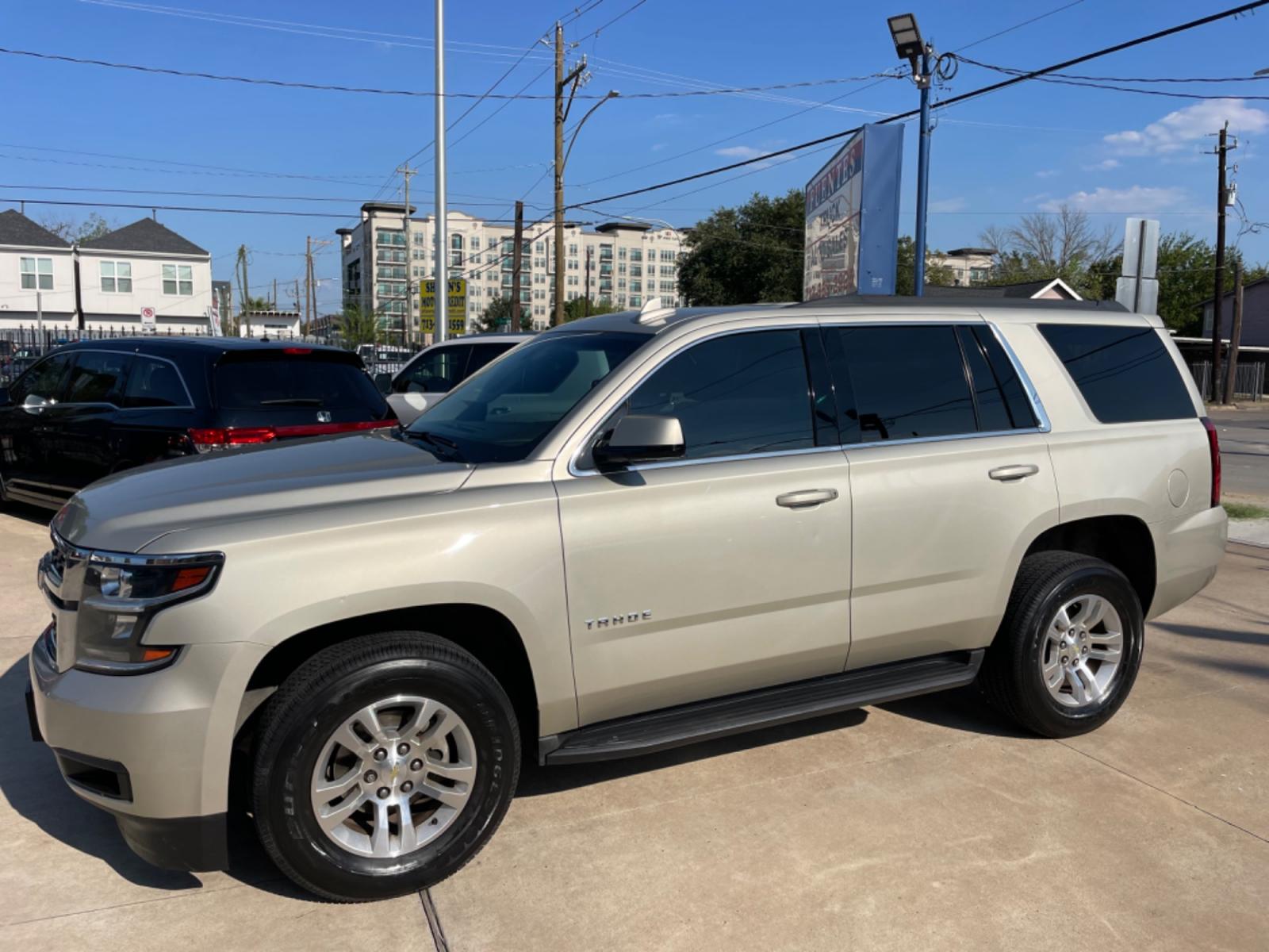 2016 Beige /Beige Chevrolet Tahoe LS 2WD (1GNSCAKCXGR) with an 5.3L V8 OHV 16V engine, 6A transmission, located at 1501 West 15th St., Houston, 77008, (713) 869-2925, 29.797941, -95.411789 - Photo #0