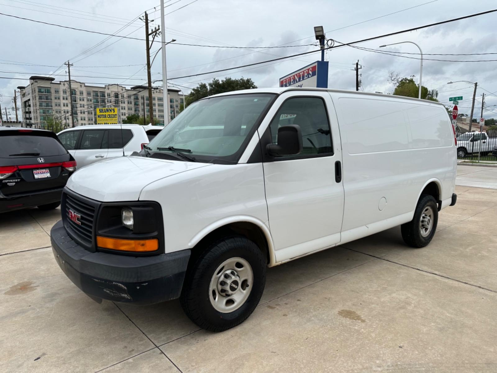 2009 White /Black GMC Savana G2500 Cargo (1GTGG25C791) with an 4.8L V8 OHV 16V engine, 4-Speed Automatic transmission, located at 1501 West 15th St., Houston, 77008, (713) 869-2925, 29.797941, -95.411789 - Photo #0