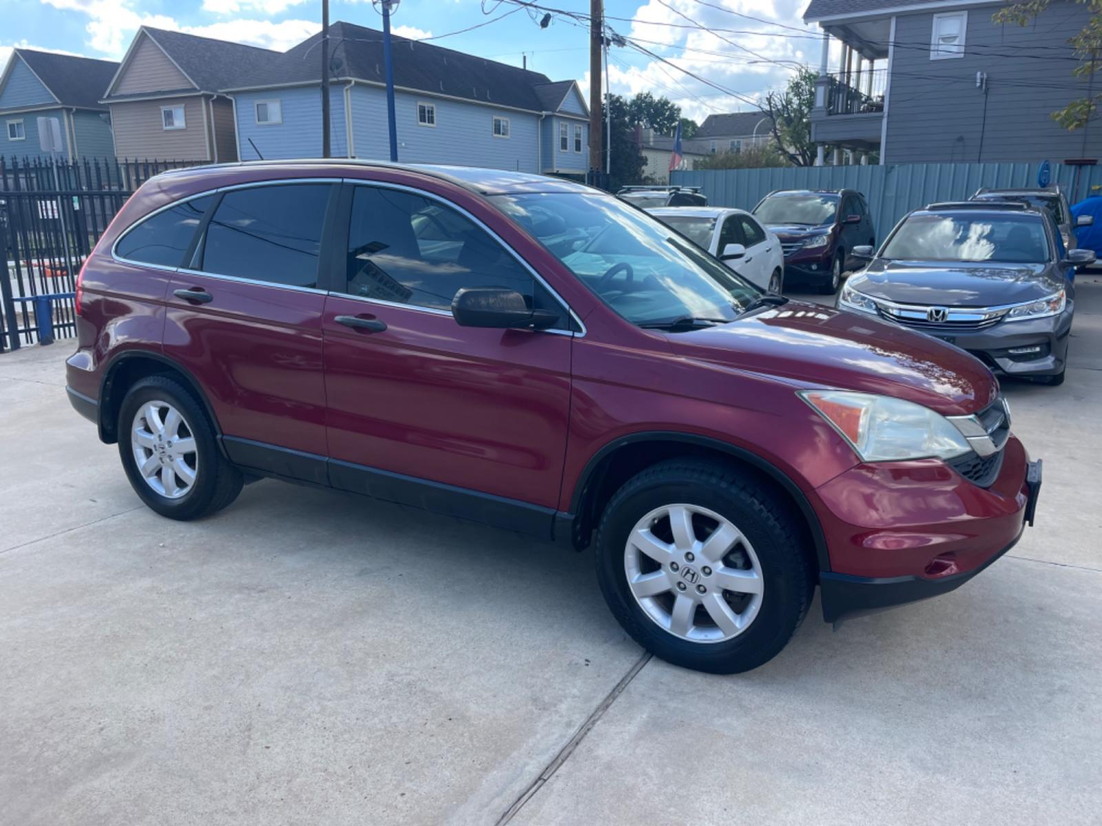 2011 Red /Silver Honda CR-V SE 2WD 5-Speed AT (5J6RE3H43BL) with an 2.4L L4 DOHC 16V engine, 5-Speed Automatic transmission, located at 1501 West 15th St., Houston, 77008, (713) 869-2925, 29.797941, -95.411789 - Photo #1
