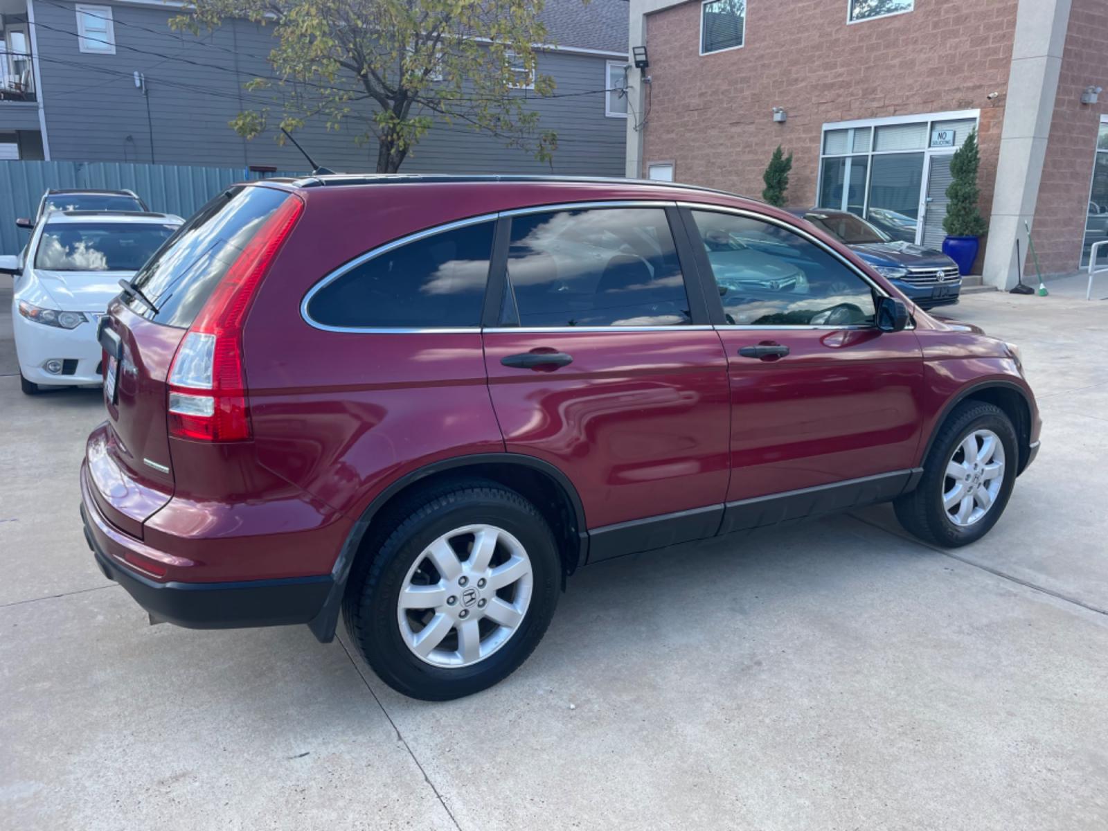 2011 Red /Silver Honda CR-V SE 2WD 5-Speed AT (5J6RE3H43BL) with an 2.4L L4 DOHC 16V engine, 5-Speed Automatic transmission, located at 1501 West 15th St., Houston, 77008, (713) 869-2925, 29.797941, -95.411789 - Photo #2
