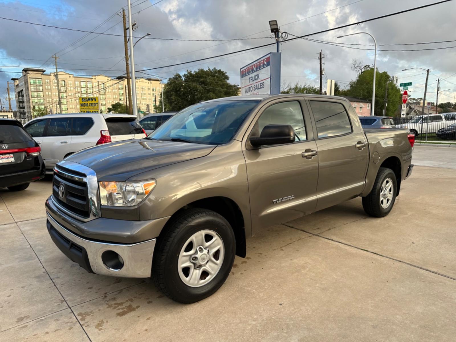 2012 Brown /Beige Toyota Tundra Tundra-Grade CrewMax 4.6L 2WD (5TFEM5F16CX) with an 4.6L V8 DOHC 32V engine, 5-Speed Automatic Overdrive transmission, located at 1501 West 15th St., Houston, 77008, (713) 869-2925, 29.797941, -95.411789 - Photo #0