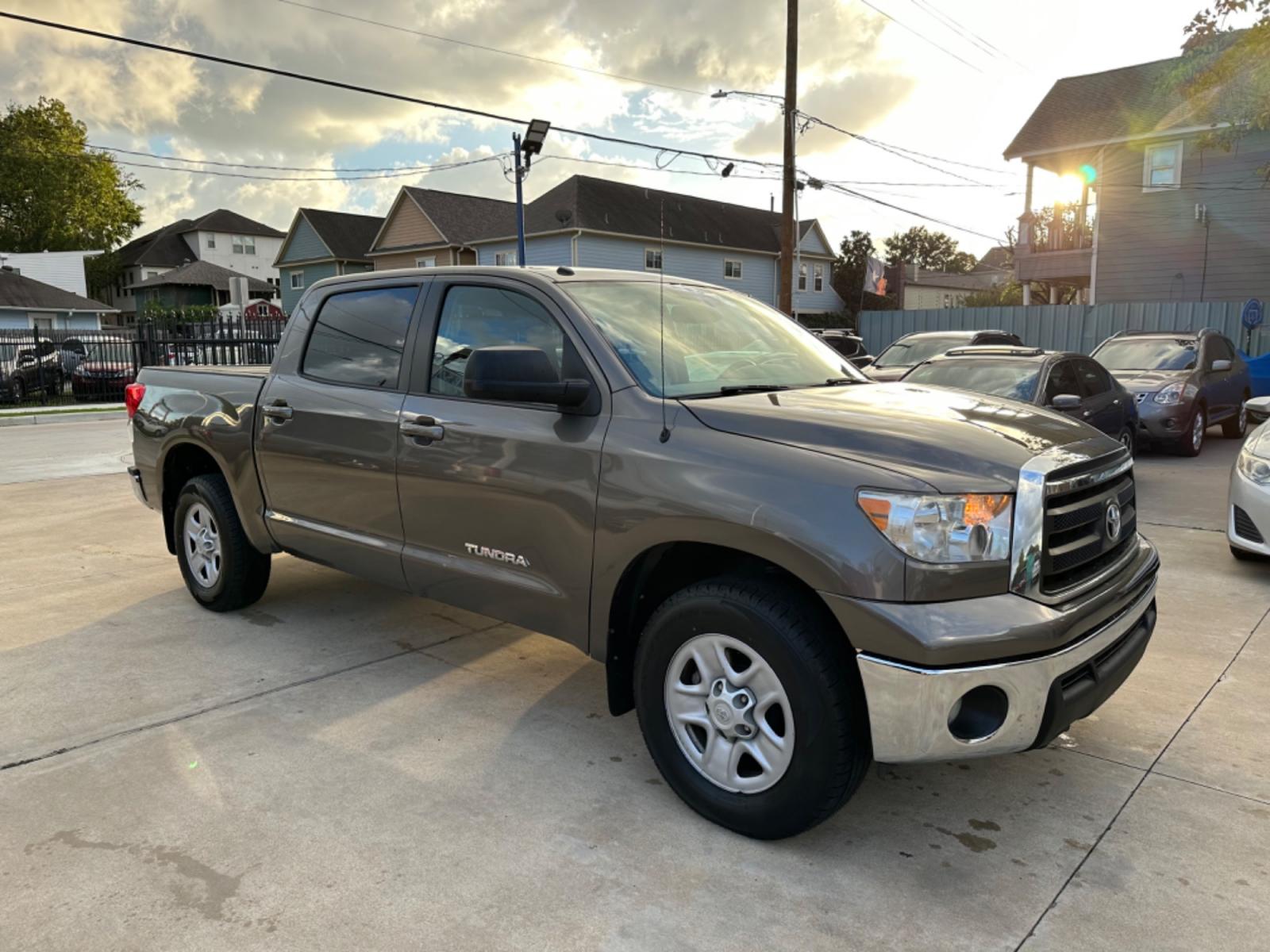 2012 Brown /Beige Toyota Tundra Tundra-Grade CrewMax 4.6L 2WD (5TFEM5F16CX) with an 4.6L V8 DOHC 32V engine, 5-Speed Automatic Overdrive transmission, located at 1501 West 15th St., Houston, 77008, (713) 869-2925, 29.797941, -95.411789 - Photo #1