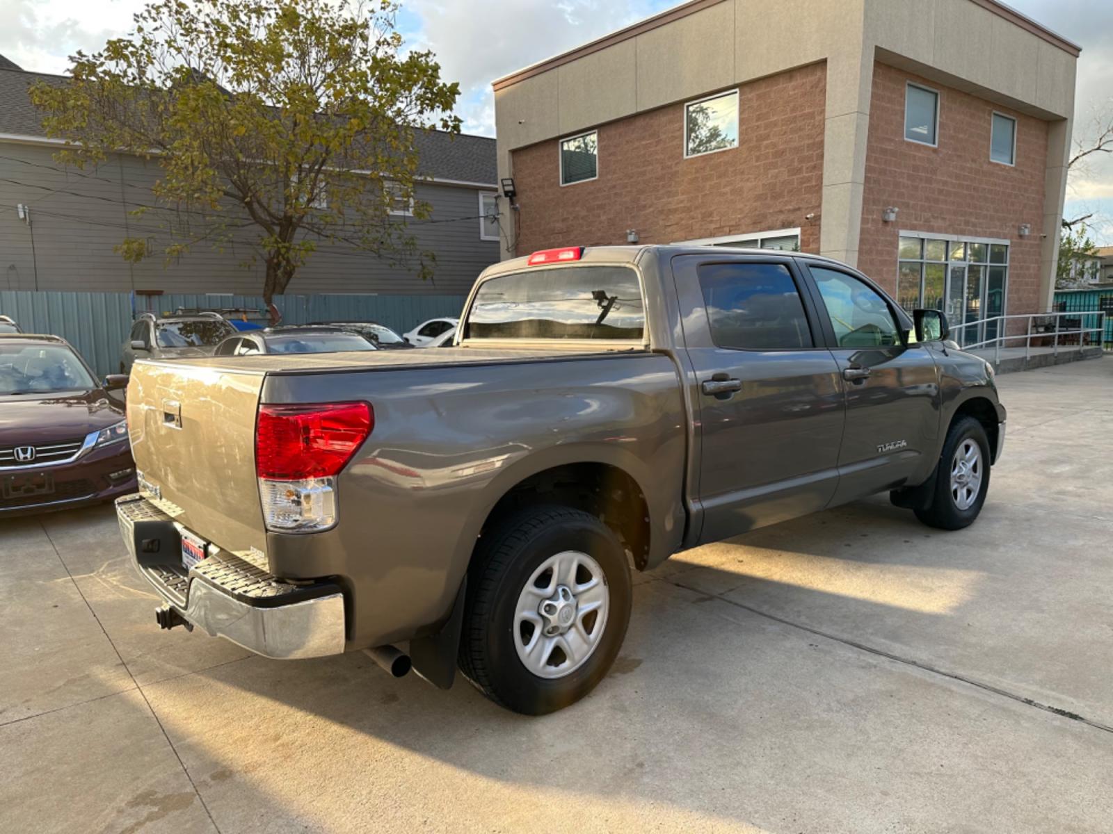 2012 Brown /Beige Toyota Tundra Tundra-Grade CrewMax 4.6L 2WD (5TFEM5F16CX) with an 4.6L V8 DOHC 32V engine, 5-Speed Automatic Overdrive transmission, located at 1501 West 15th St., Houston, 77008, (713) 869-2925, 29.797941, -95.411789 - Photo #2