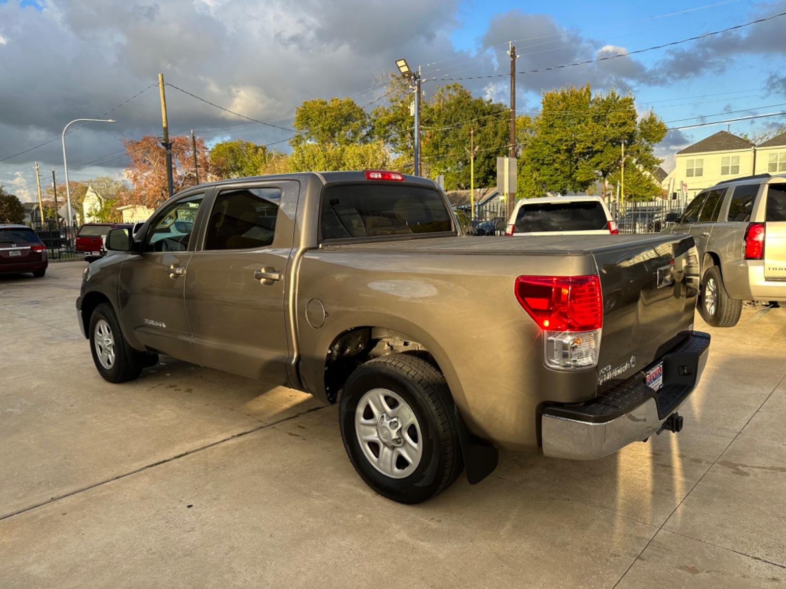 2012 Brown /Beige Toyota Tundra Tundra-Grade CrewMax 4.6L 2WD (5TFEM5F16CX) with an 4.6L V8 DOHC 32V engine, 5-Speed Automatic Overdrive transmission, located at 1501 West 15th St., Houston, 77008, (713) 869-2925, 29.797941, -95.411789 - Photo #3