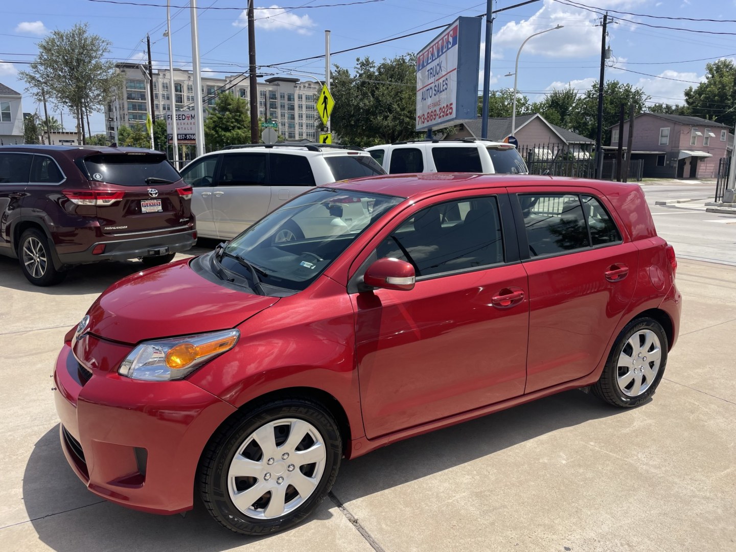 2014 Red /Black Scion xD 5-Door Hatchback 4-Spd AT (JTKKUPB47E1) with an 1.8L L4 DOHC16V engine, 4-Speed Automatic transmission, located at 1501 West 15th St., Houston, 77008, (713) 869-2925, 29.797941, -95.411789- Photo#0