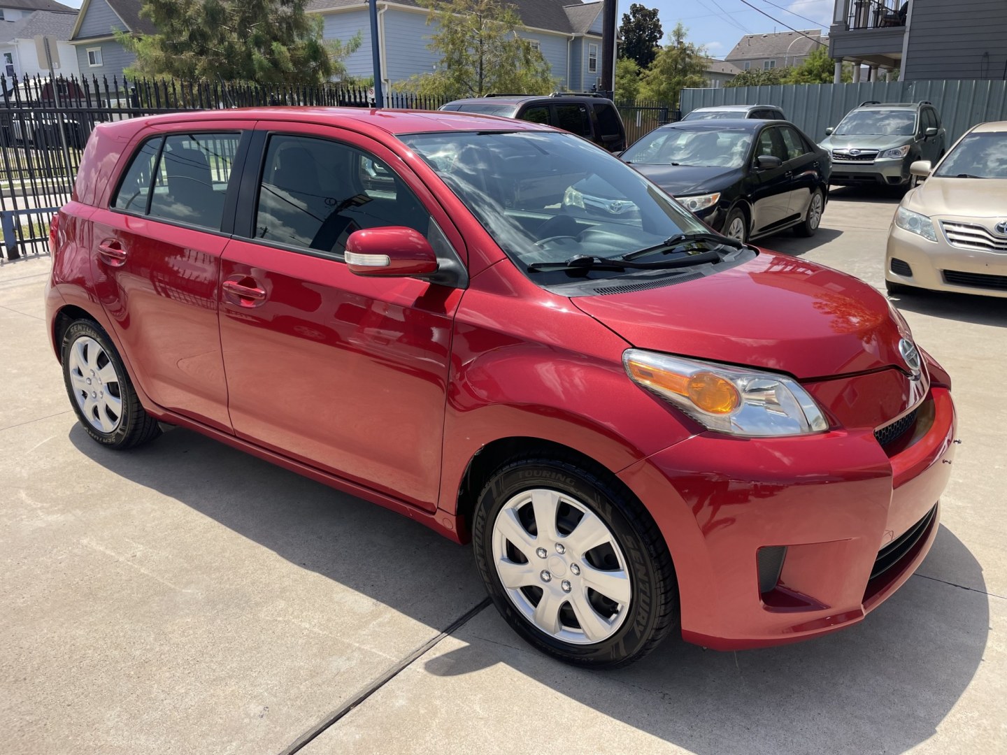 2014 Red /Black Scion xD 5-Door Hatchback 4-Spd AT (JTKKUPB47E1) with an 1.8L L4 DOHC16V engine, 4-Speed Automatic transmission, located at 1501 West 15th St., Houston, 77008, (713) 869-2925, 29.797941, -95.411789- Photo#1