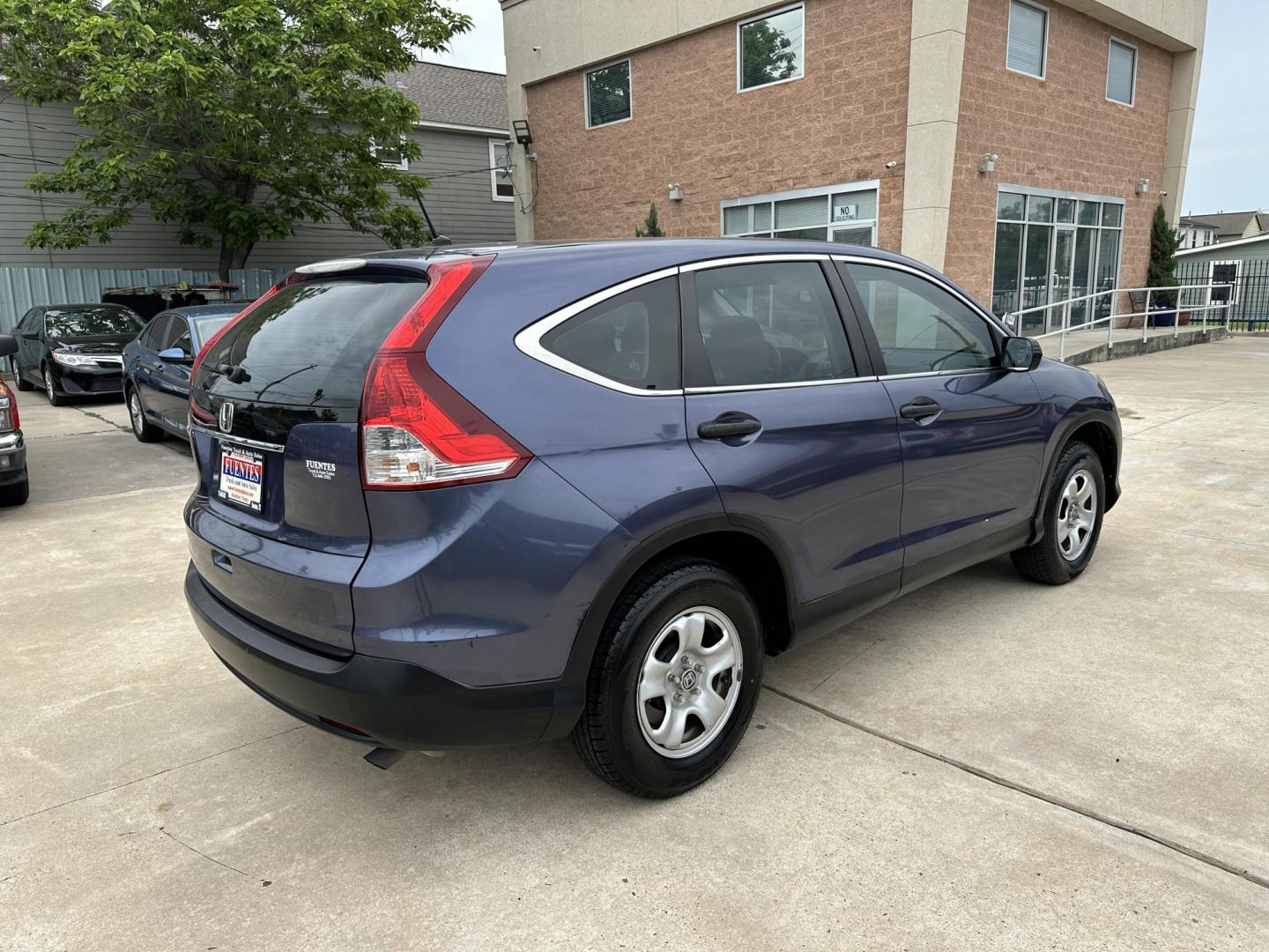 2014 Blue /Silver Honda CR-V LX 2WD 5-Speed AT (3CZRM3H33EG) with an 2.4L L4 DOHC 16V engine, 5-Speed Automatic transmission, located at 1501 West 15th St., Houston, 77008, (713) 869-2925, 29.797941, -95.411789 - Photo#2