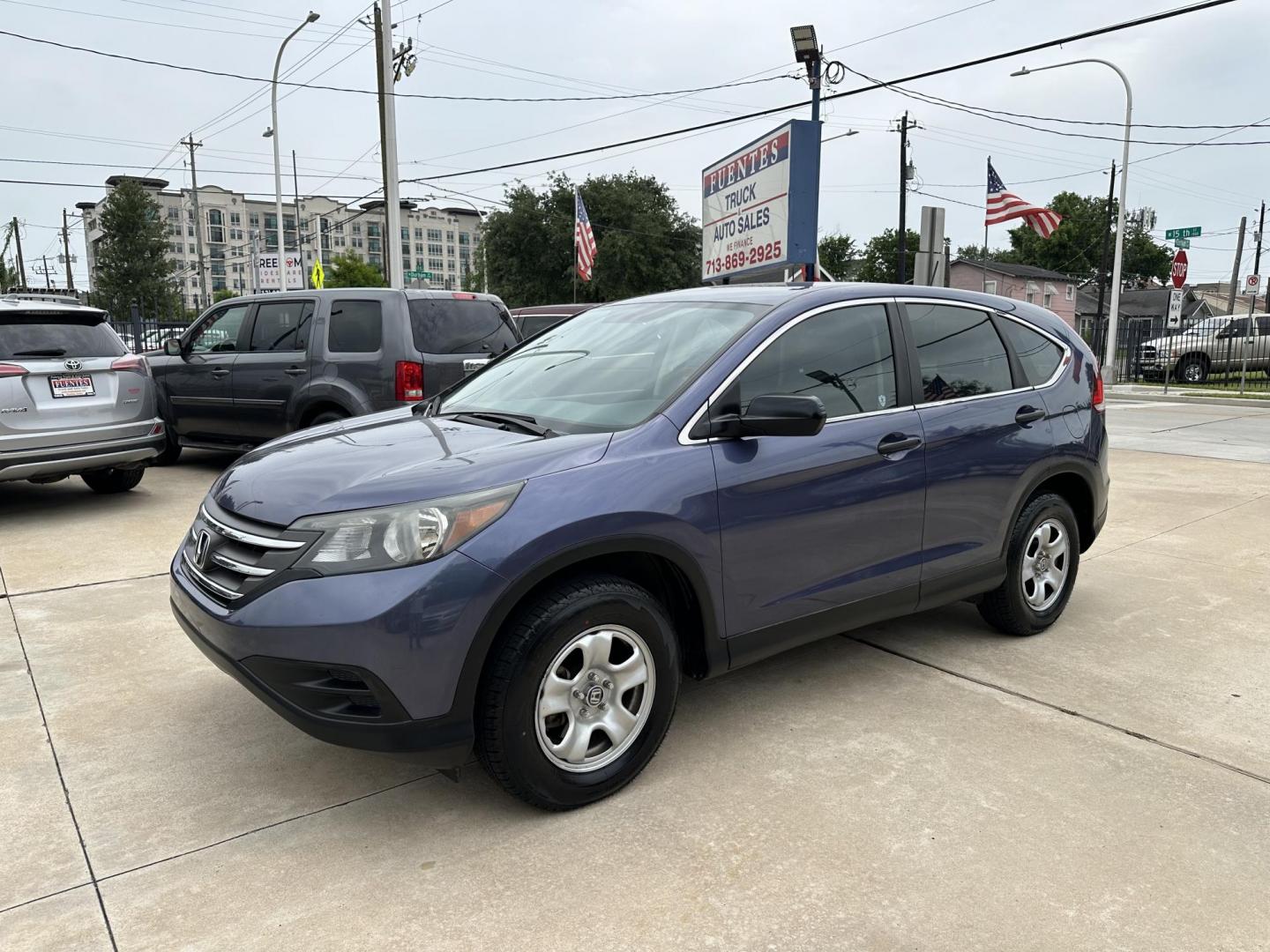 2014 Blue /Silver Honda CR-V LX 2WD 5-Speed AT (3CZRM3H33EG) with an 2.4L L4 DOHC 16V engine, 5-Speed Automatic transmission, located at 1501 West 15th St., Houston, 77008, (713) 869-2925, 29.797941, -95.411789 - Photo#0