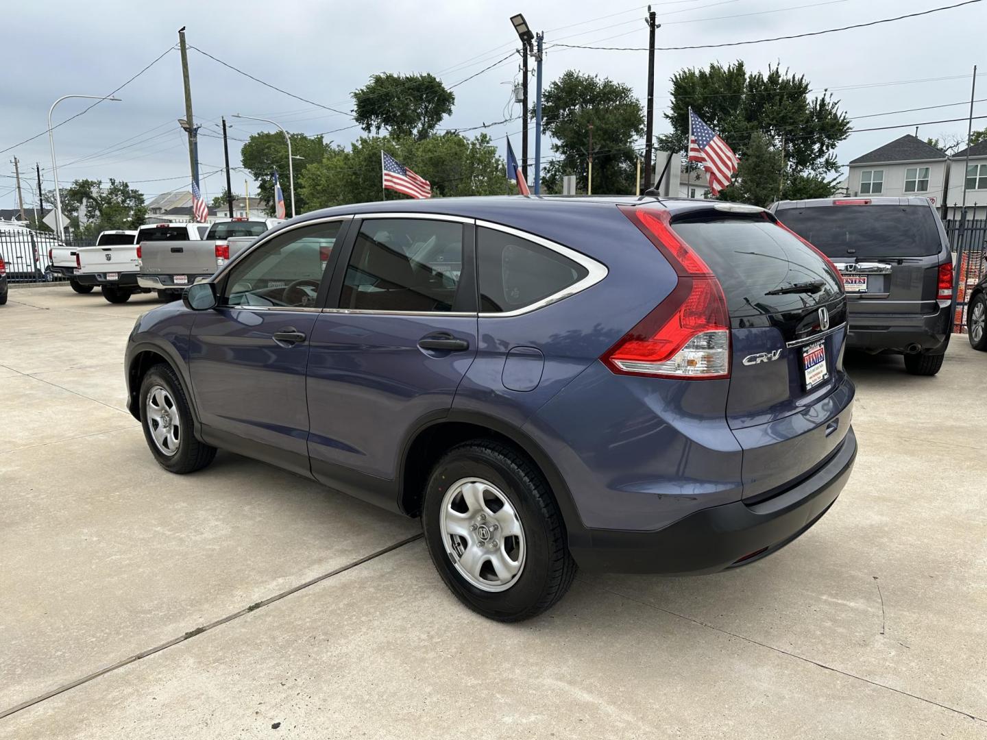 2014 Blue /Silver Honda CR-V LX 2WD 5-Speed AT (3CZRM3H33EG) with an 2.4L L4 DOHC 16V engine, 5-Speed Automatic transmission, located at 1501 West 15th St., Houston, 77008, (713) 869-2925, 29.797941, -95.411789 - Photo#3
