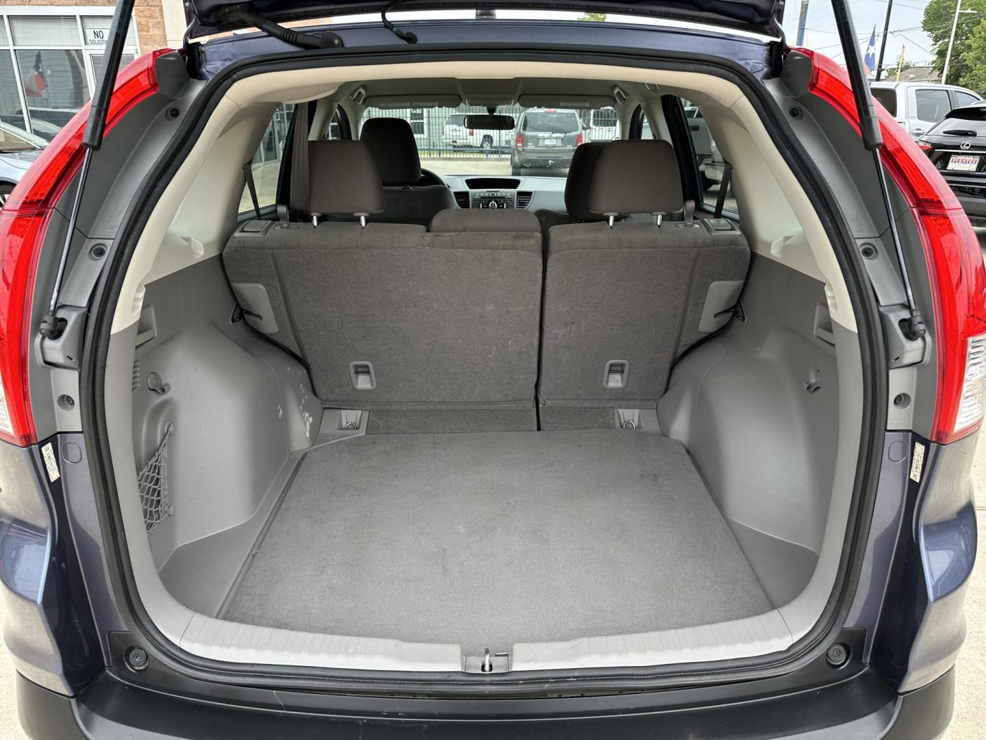 2014 Blue /Silver Honda CR-V LX 2WD 5-Speed AT (3CZRM3H33EG) with an 2.4L L4 DOHC 16V engine, 5-Speed Automatic transmission, located at 1501 West 15th St., Houston, 77008, (713) 869-2925, 29.797941, -95.411789 - Photo#4