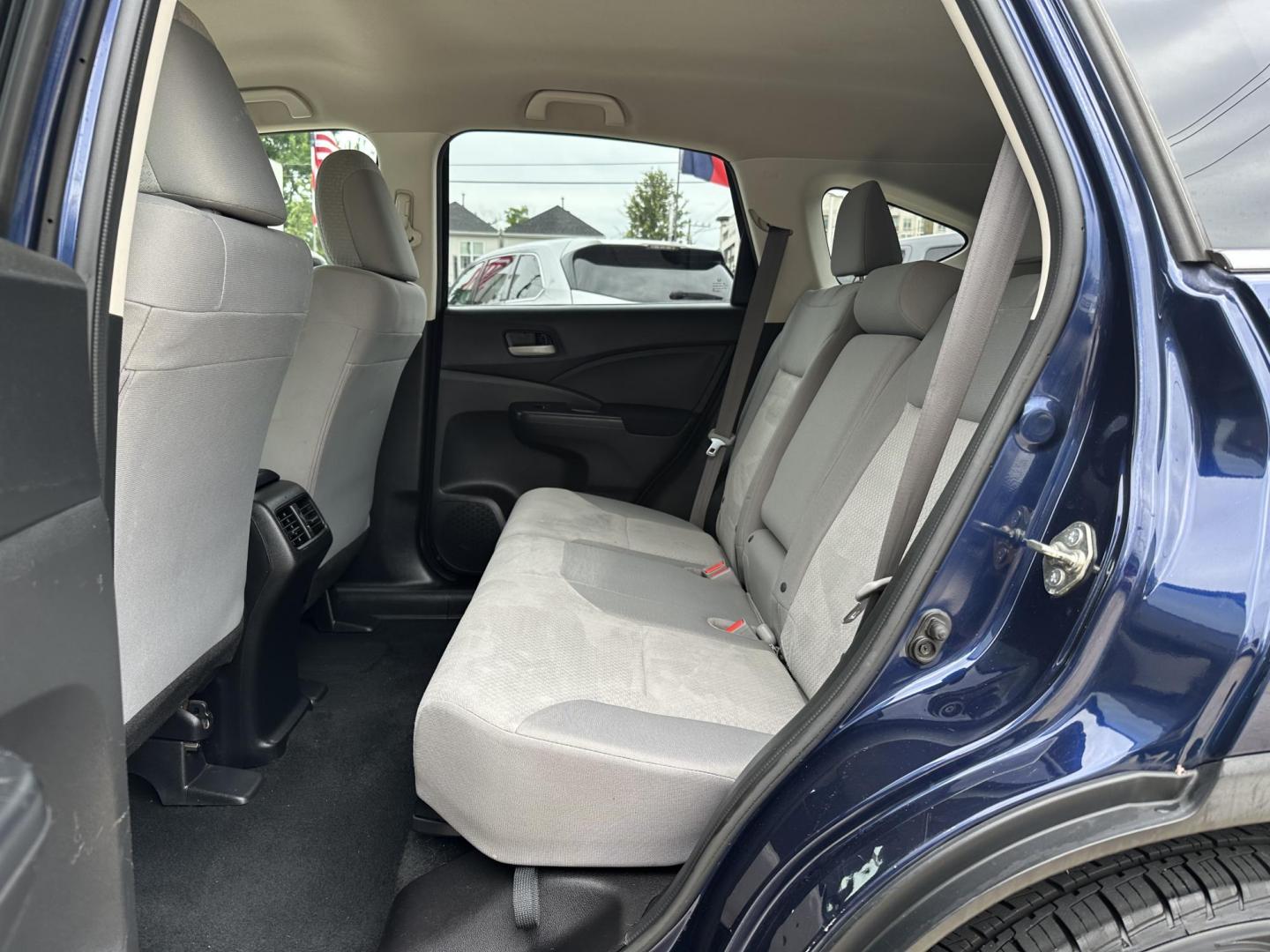 2016 Blue /Silver Honda CR-V SE 2WD (2HKRM3H45GH) with an 2.4L L4 DOHC 16V engine, CVT transmission, located at 1501 West 15th St., Houston, 77008, (713) 869-2925, 29.797941, -95.411789 - Photo#7