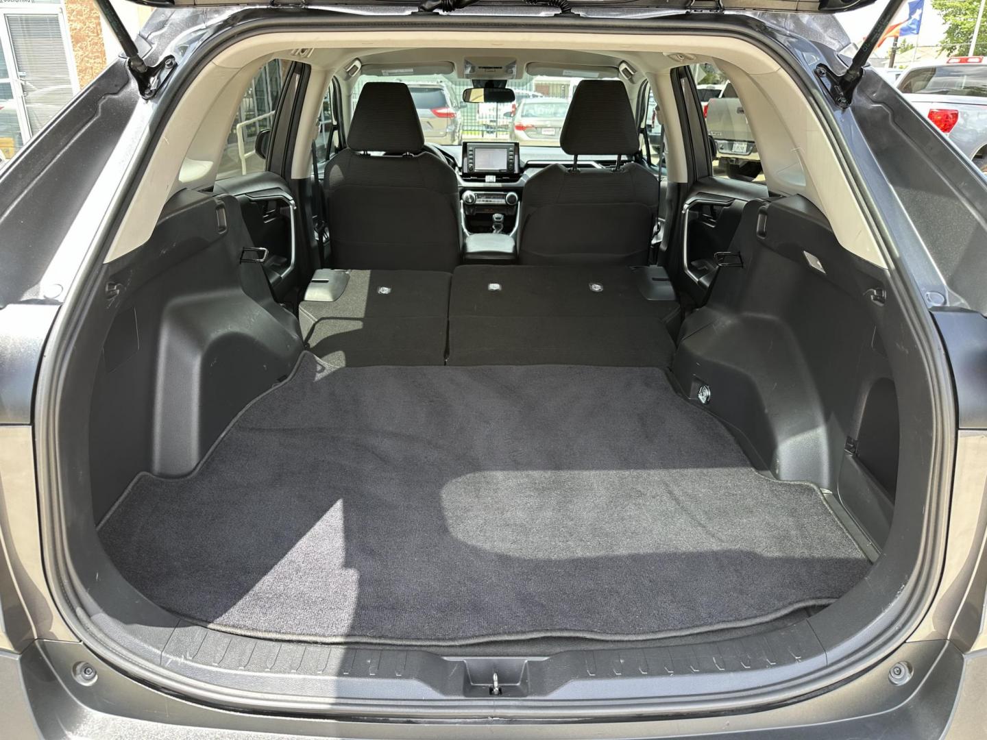 2021 Gray /Black Toyota RAV4 LE (2T3H1RFVXMC) with an 2.5L L4 DOHC 16V engine, 8A transmission, located at 1501 West 15th St., Houston, 77008, (713) 869-2925, 29.797941, -95.411789 - Photo#4