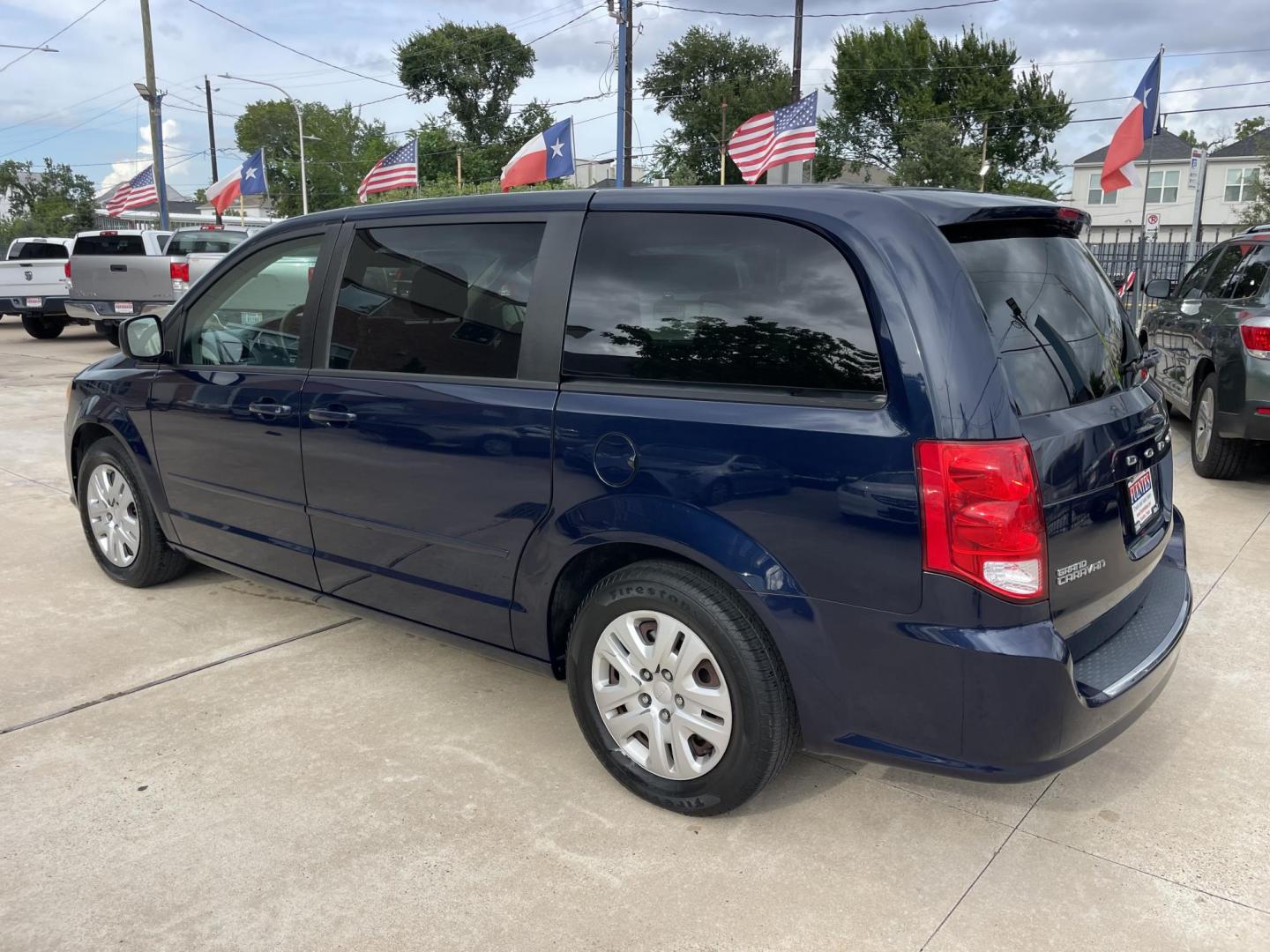 2014 Blue /Black Dodge Grand Caravan SE (2C4RDGBG7ER) with an 3.6L V6 DOHC 24V engine, 6-Speed Automatic transmission, located at 1501 West 15th St., Houston, 77008, (713) 869-2925, 29.797941, -95.411789 - Photo#3