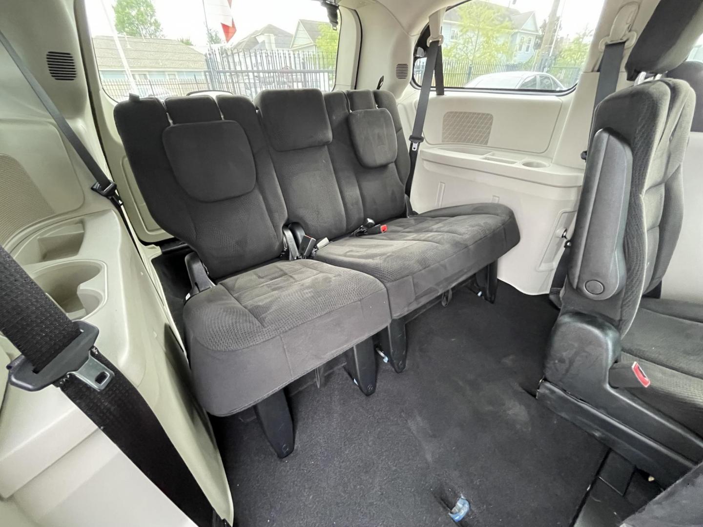 2014 Blue /Black Dodge Grand Caravan SE (2C4RDGBG7ER) with an 3.6L V6 DOHC 24V engine, 6-Speed Automatic transmission, located at 1501 West 15th St., Houston, 77008, (713) 869-2925, 29.797941, -95.411789 - Photo#8