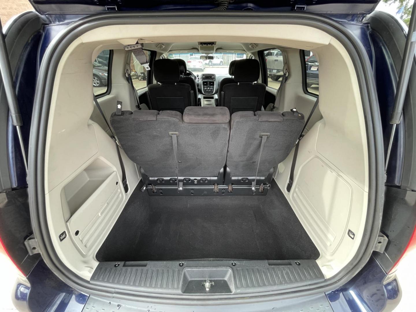 2014 Blue /Black Dodge Grand Caravan SE (2C4RDGBG7ER) with an 3.6L V6 DOHC 24V engine, 6-Speed Automatic transmission, located at 1501 West 15th St., Houston, 77008, (713) 869-2925, 29.797941, -95.411789 - Photo#10