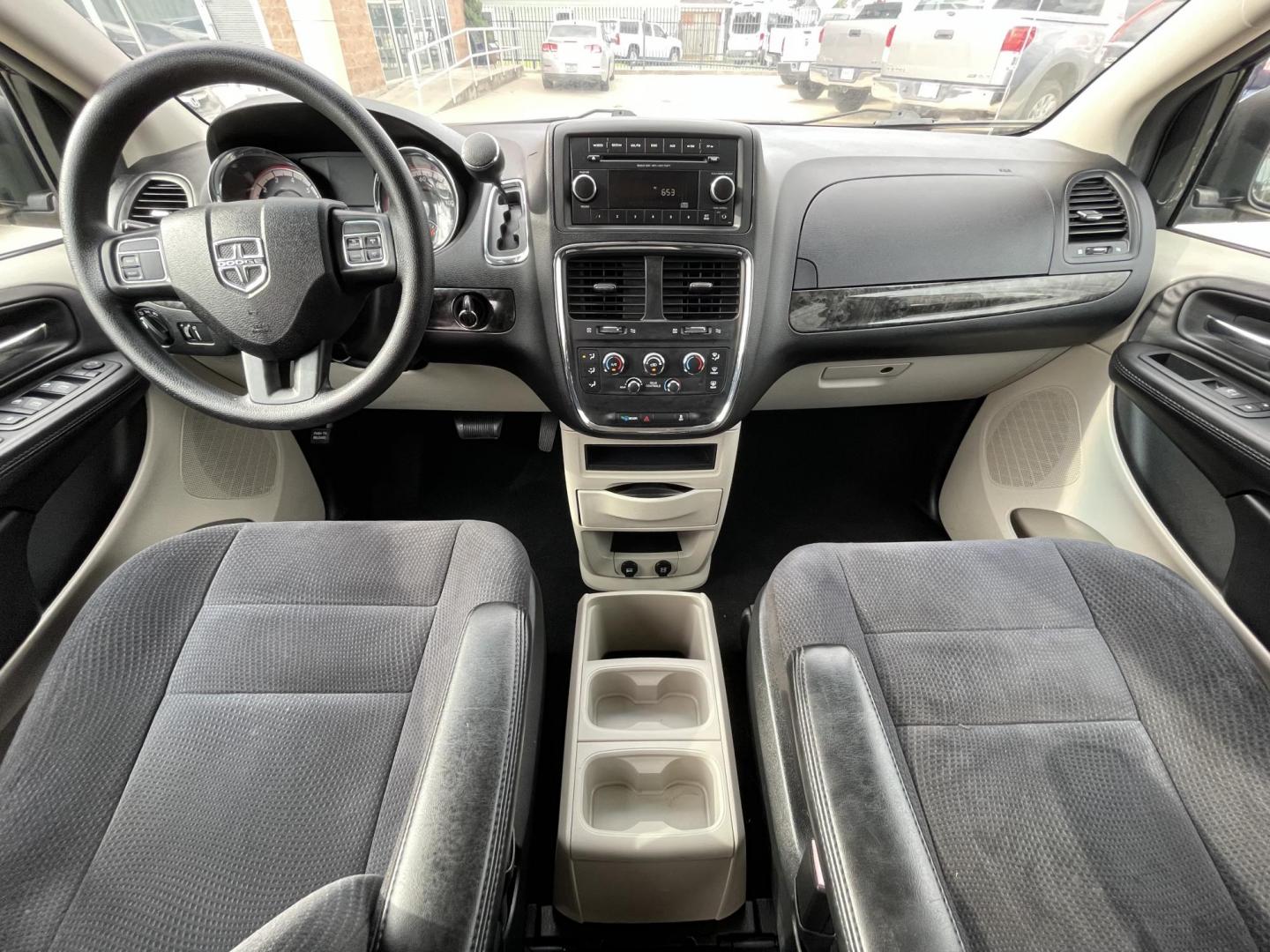 2014 Blue /Black Dodge Grand Caravan SE (2C4RDGBG7ER) with an 3.6L V6 DOHC 24V engine, 6-Speed Automatic transmission, located at 1501 West 15th St., Houston, 77008, (713) 869-2925, 29.797941, -95.411789 - Photo#11