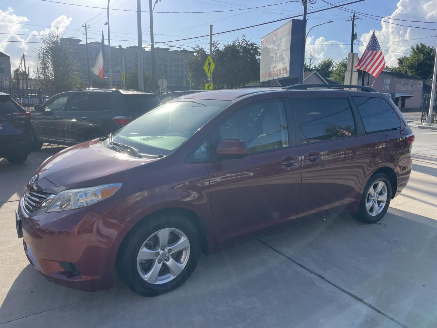 2017 Red /Silver Toyota Sienna LE 8-Passenger (5TDKZ3DC9HS) with an 3.5L V6 EFI DOHC 24V engine, 8A transmission, located at 1501 West 15th St., Houston, 77008, (713) 869-2925, 29.797941, -95.411789 - Photo#0