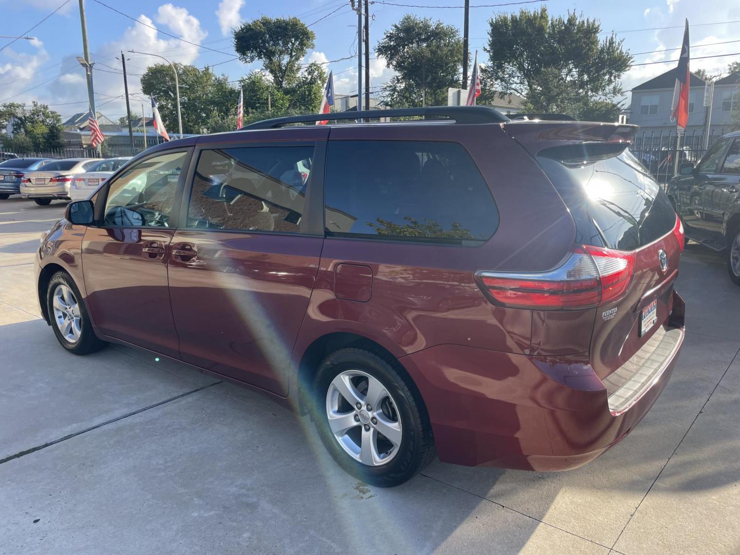 2017 Red /Silver Toyota Sienna LE 8-Passenger (5TDKZ3DC9HS) with an 3.5L V6 EFI DOHC 24V engine, 8A transmission, located at 1501 West 15th St., Houston, 77008, (713) 869-2925, 29.797941, -95.411789 - Photo#3