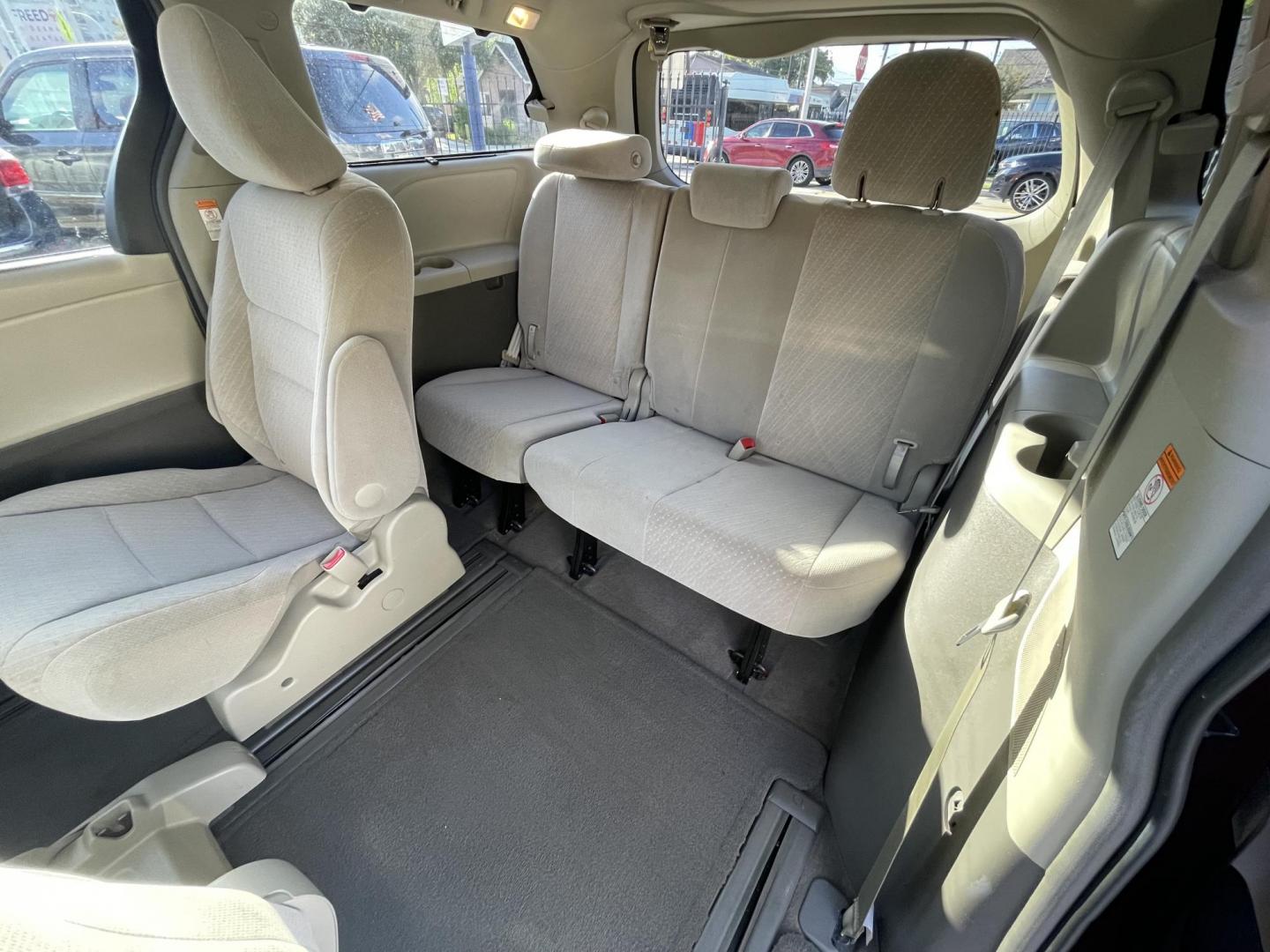 2017 Red /Silver Toyota Sienna LE 8-Passenger (5TDKZ3DC9HS) with an 3.5L V6 EFI DOHC 24V engine, 8A transmission, located at 1501 West 15th St., Houston, 77008, (713) 869-2925, 29.797941, -95.411789 - Photo#6