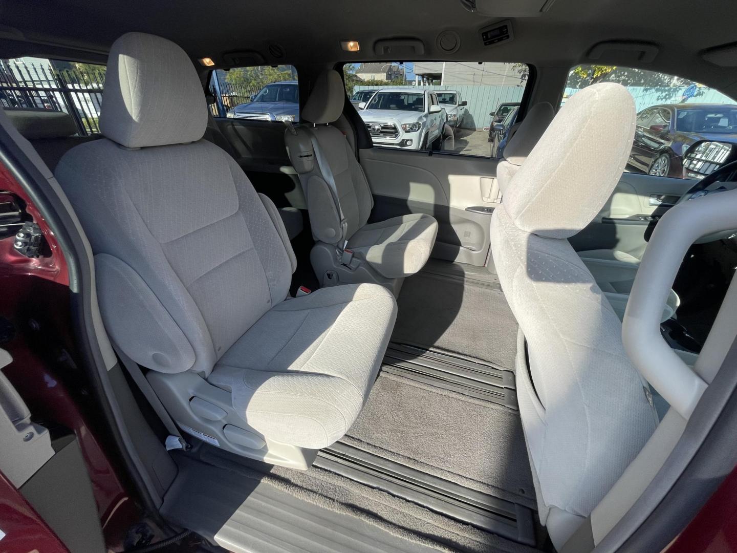 2017 Red /Silver Toyota Sienna LE 8-Passenger (5TDKZ3DC9HS) with an 3.5L V6 EFI DOHC 24V engine, 8A transmission, located at 1501 West 15th St., Houston, 77008, (713) 869-2925, 29.797941, -95.411789 - Photo#7