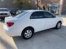 2006 White /Beige Toyota Corolla CE (1NXBR30E66Z) with an 1.8L L4 DOHC 16V engine, Automatic transmission, located at 1501 West 15th St., Houston, 77008, (713) 869-2925, 29.797941, -95.411789 - Photo#3