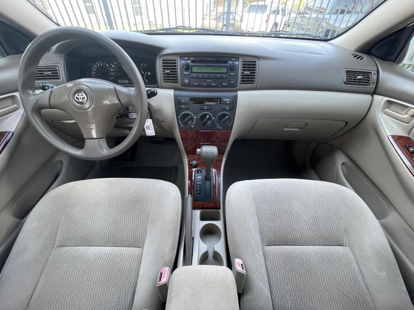 2006 White /Beige Toyota Corolla CE (1NXBR30E66Z) with an 1.8L L4 DOHC 16V engine, Automatic transmission, located at 1501 West 15th St., Houston, 77008, (713) 869-2925, 29.797941, -95.411789 - Photo#9