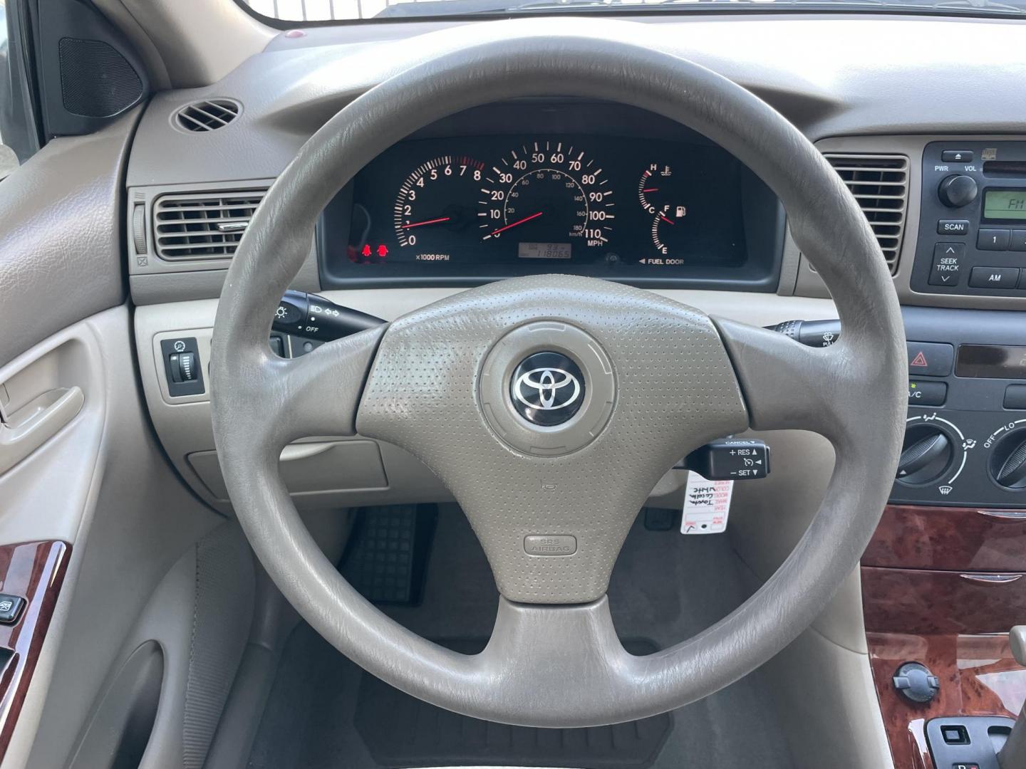 2006 White /Beige Toyota Corolla CE (1NXBR30E66Z) with an 1.8L L4 DOHC 16V engine, Automatic transmission, located at 1501 West 15th St., Houston, 77008, (713) 869-2925, 29.797941, -95.411789 - Photo#10