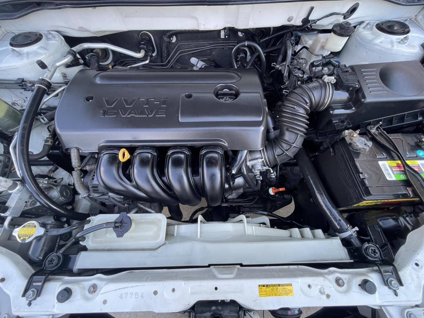 2006 White /Beige Toyota Corolla CE (1NXBR30E66Z) with an 1.8L L4 DOHC 16V engine, Automatic transmission, located at 1501 West 15th St., Houston, 77008, (713) 869-2925, 29.797941, -95.411789 - Photo#13