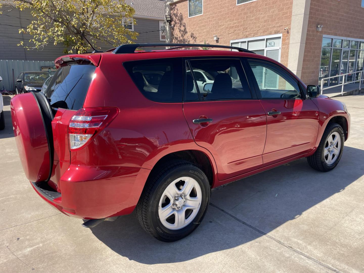 2011 Red /Silver Toyota RAV4 Base I4 2WD (2T3ZF4DV2BW) with an 2.4L L4 DOHC 16V engine, 4-Speed Automatic transmission, located at 1501 West 15th St., Houston, 77008, (713) 869-2925, 29.797941, -95.411789 - Photo#2