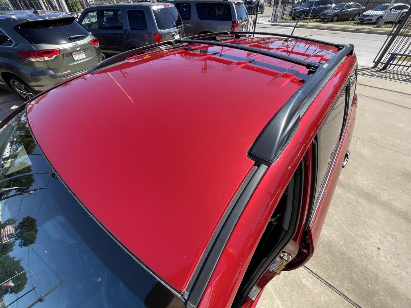 2011 Red /Silver Toyota RAV4 Base I4 2WD (2T3ZF4DV2BW) with an 2.4L L4 DOHC 16V engine, 4-Speed Automatic transmission, located at 1501 West 15th St., Houston, 77008, (713) 869-2925, 29.797941, -95.411789 - Photo#6