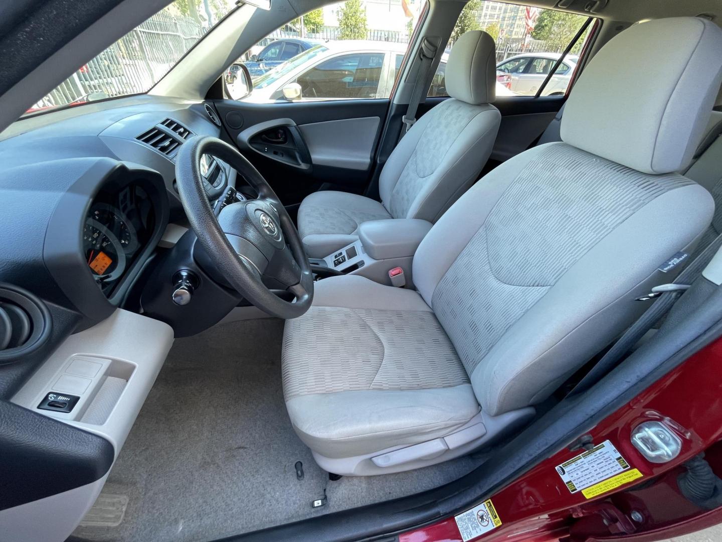 2011 Red /Silver Toyota RAV4 Base I4 2WD (2T3ZF4DV2BW) with an 2.4L L4 DOHC 16V engine, 4-Speed Automatic transmission, located at 1501 West 15th St., Houston, 77008, (713) 869-2925, 29.797941, -95.411789 - Photo#9