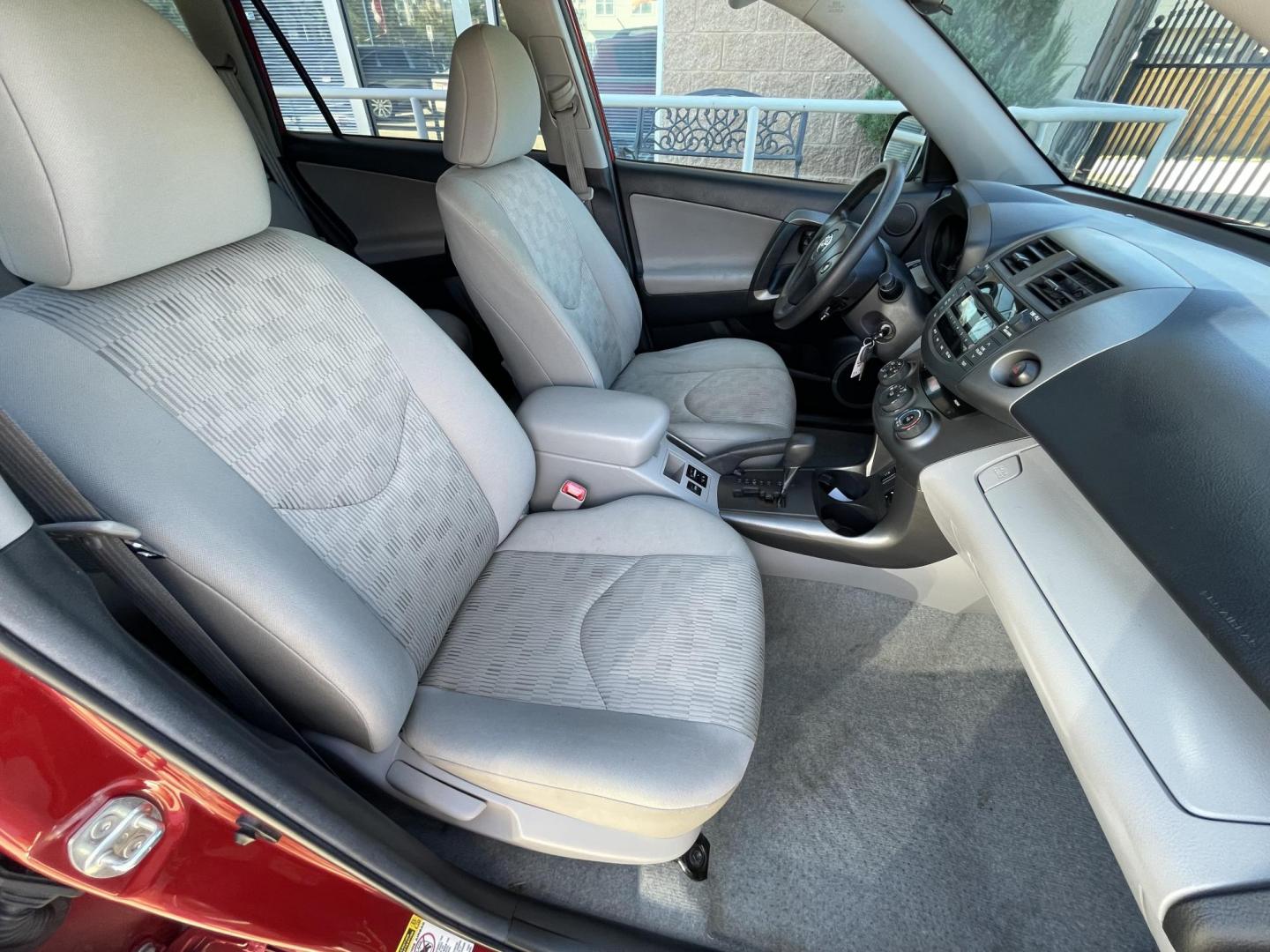 2011 Red /Silver Toyota RAV4 Base I4 2WD (2T3ZF4DV2BW) with an 2.4L L4 DOHC 16V engine, 4-Speed Automatic transmission, located at 1501 West 15th St., Houston, 77008, (713) 869-2925, 29.797941, -95.411789 - Photo#12